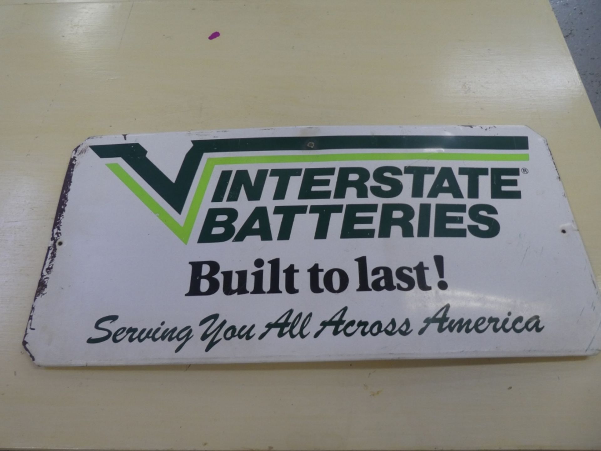 METAL INTERSTATE BATTERIES SIGN 9.5"H 20"W (SINGLE SIDED)