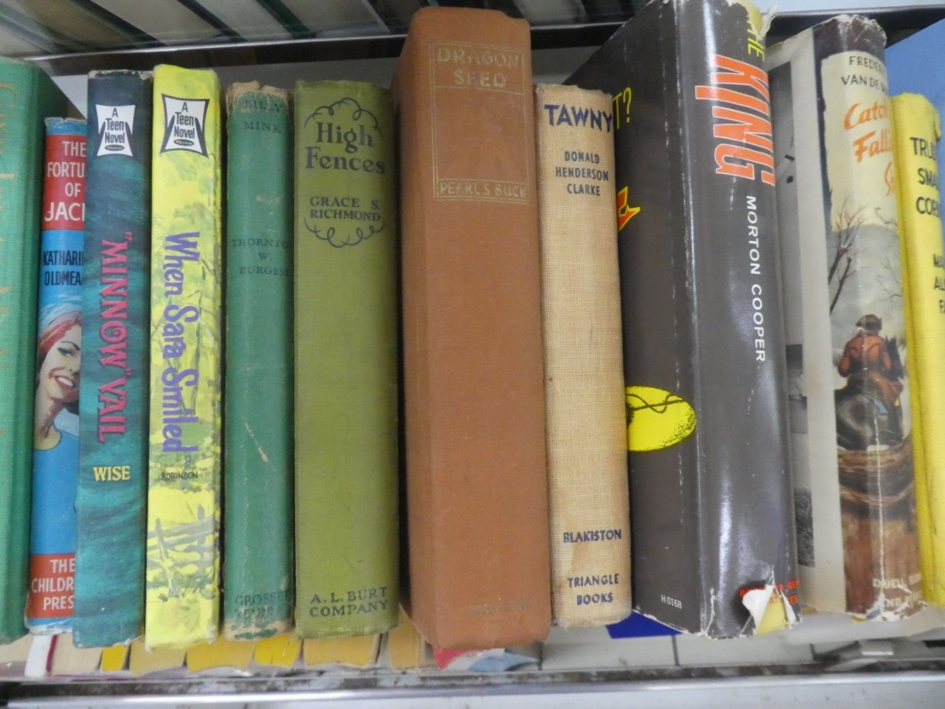 SHELF OF HARDCOVER BOOKS