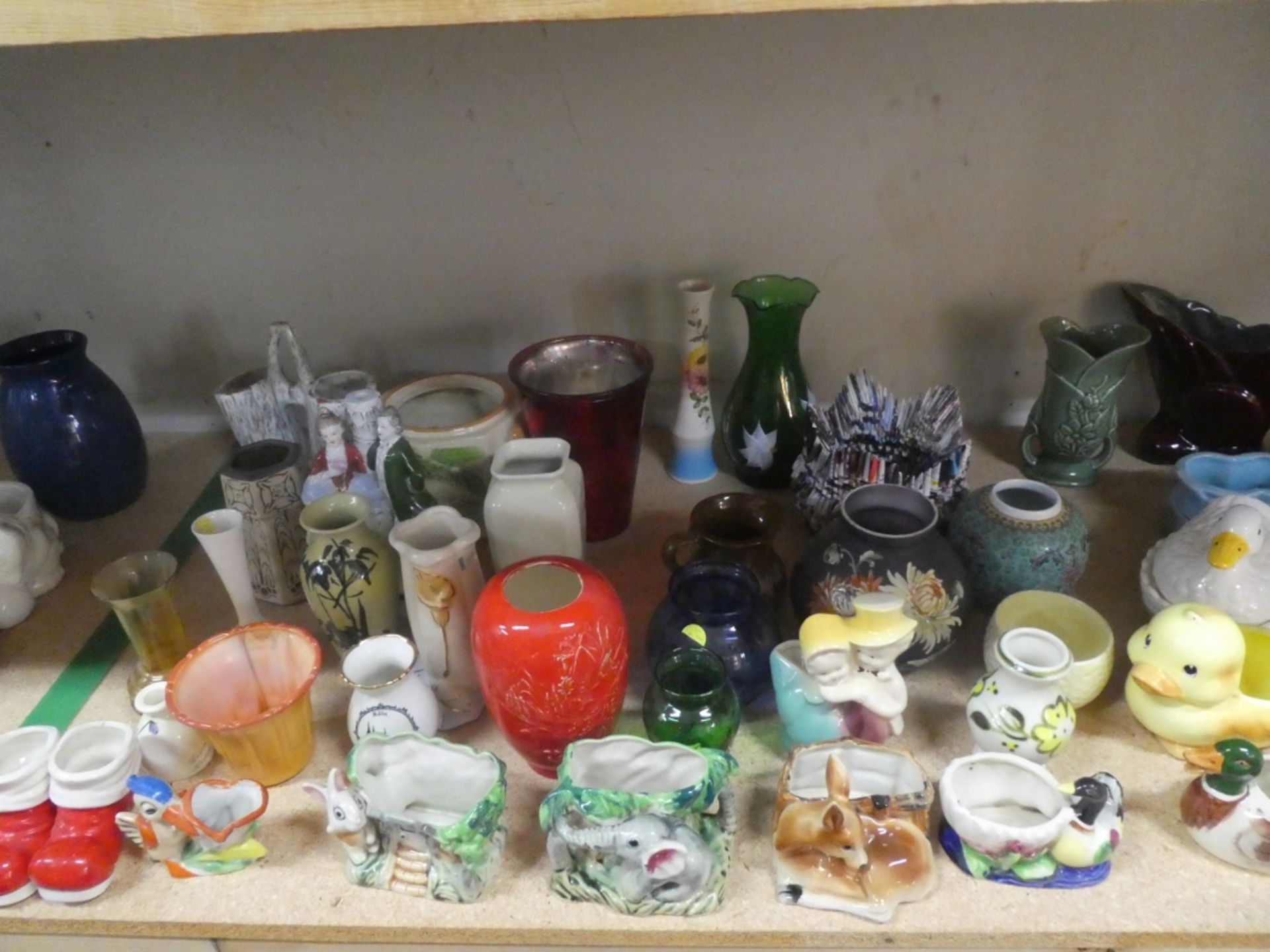 SHELF OF VASES, PLANTERS ETC.