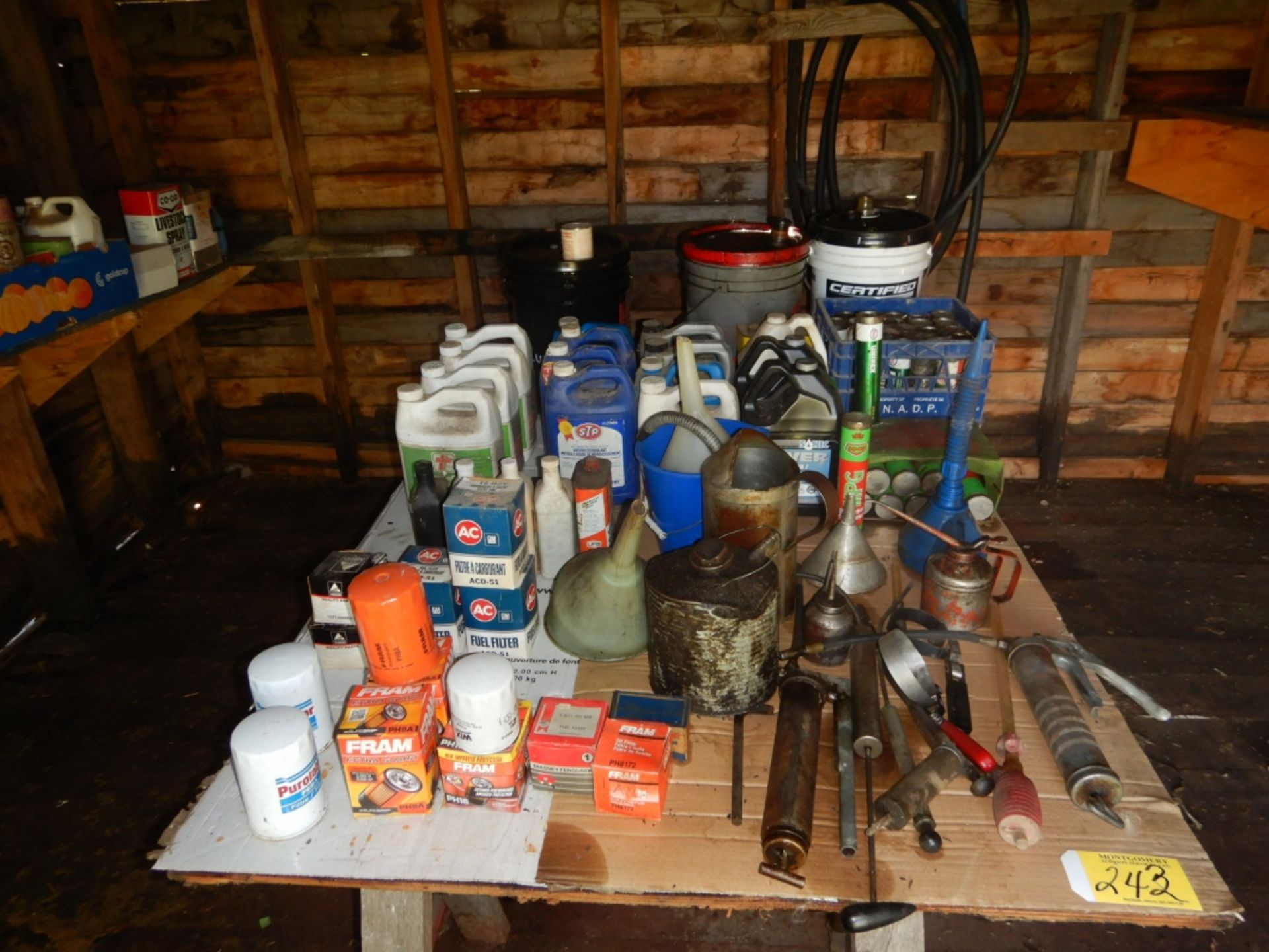 CONTENTS OF BUILDING INCLUDING OIL, GREASE, WWA, ANTIFREEZE, JERRY CANS, OILFILTERS, GREASE GUN, - Image 2 of 6