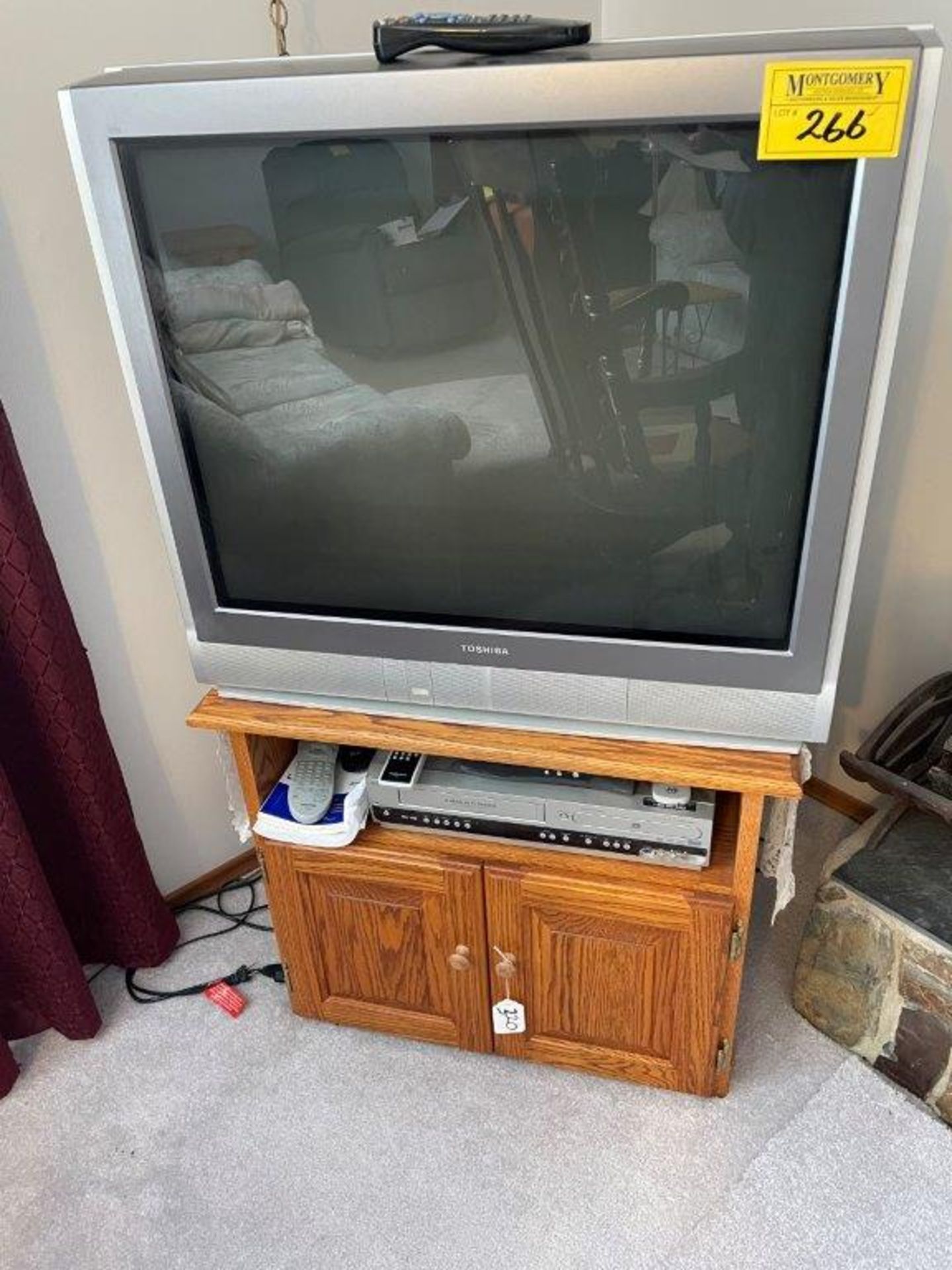 TOSHIBA 32IN TV, BELL SATELITE RECIEVER, MAGNAVOX DVD/VHS PLAYER, STERIO SYSTEM W/ CASETTES, CD'