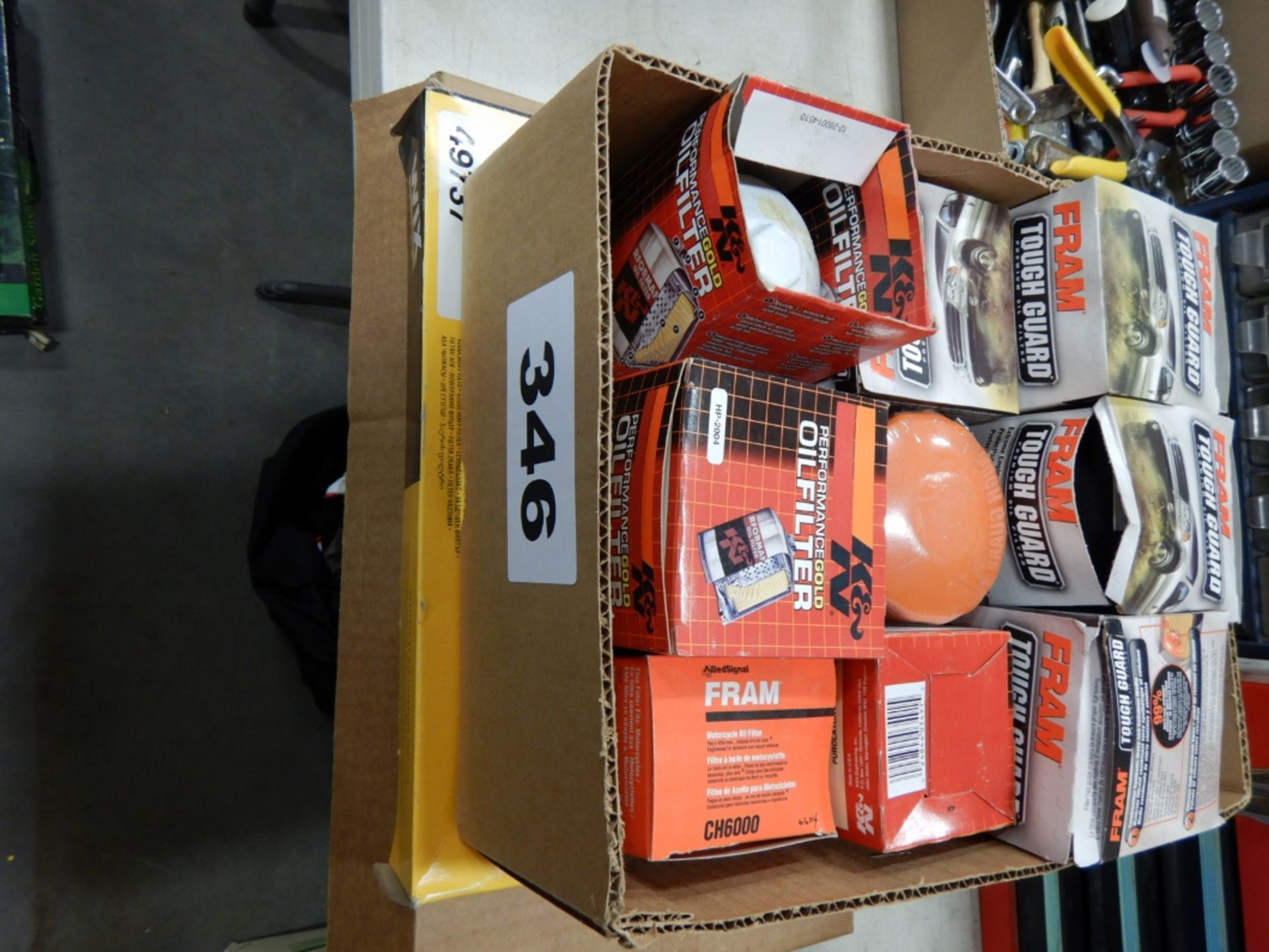 BOX OF ASSORTED FRAM OIL FILTERS AND AIR FILTERS