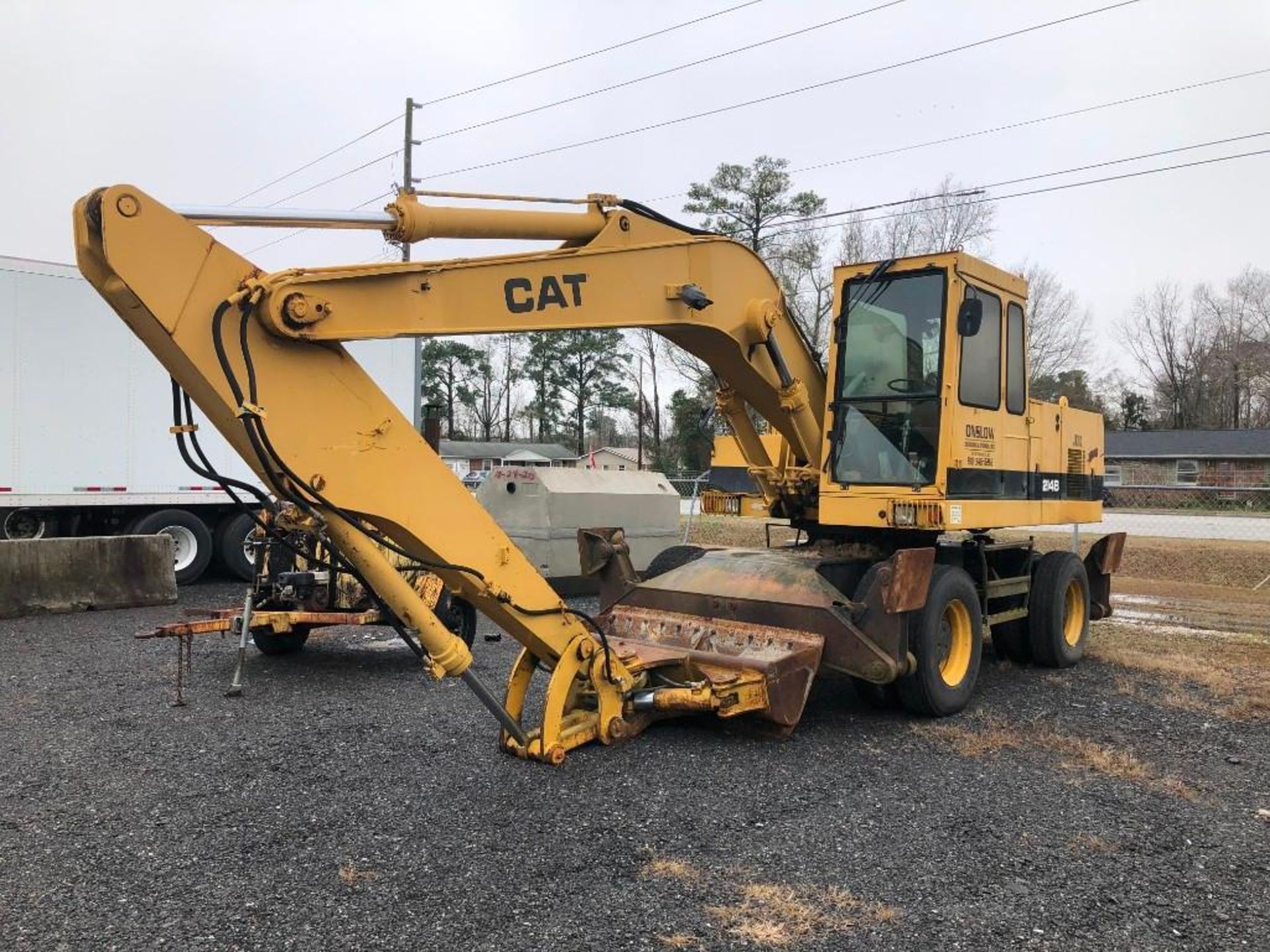 1993 CATERPILLAR 214B MOBILE EXCAVATOR (UNIT #JB703)