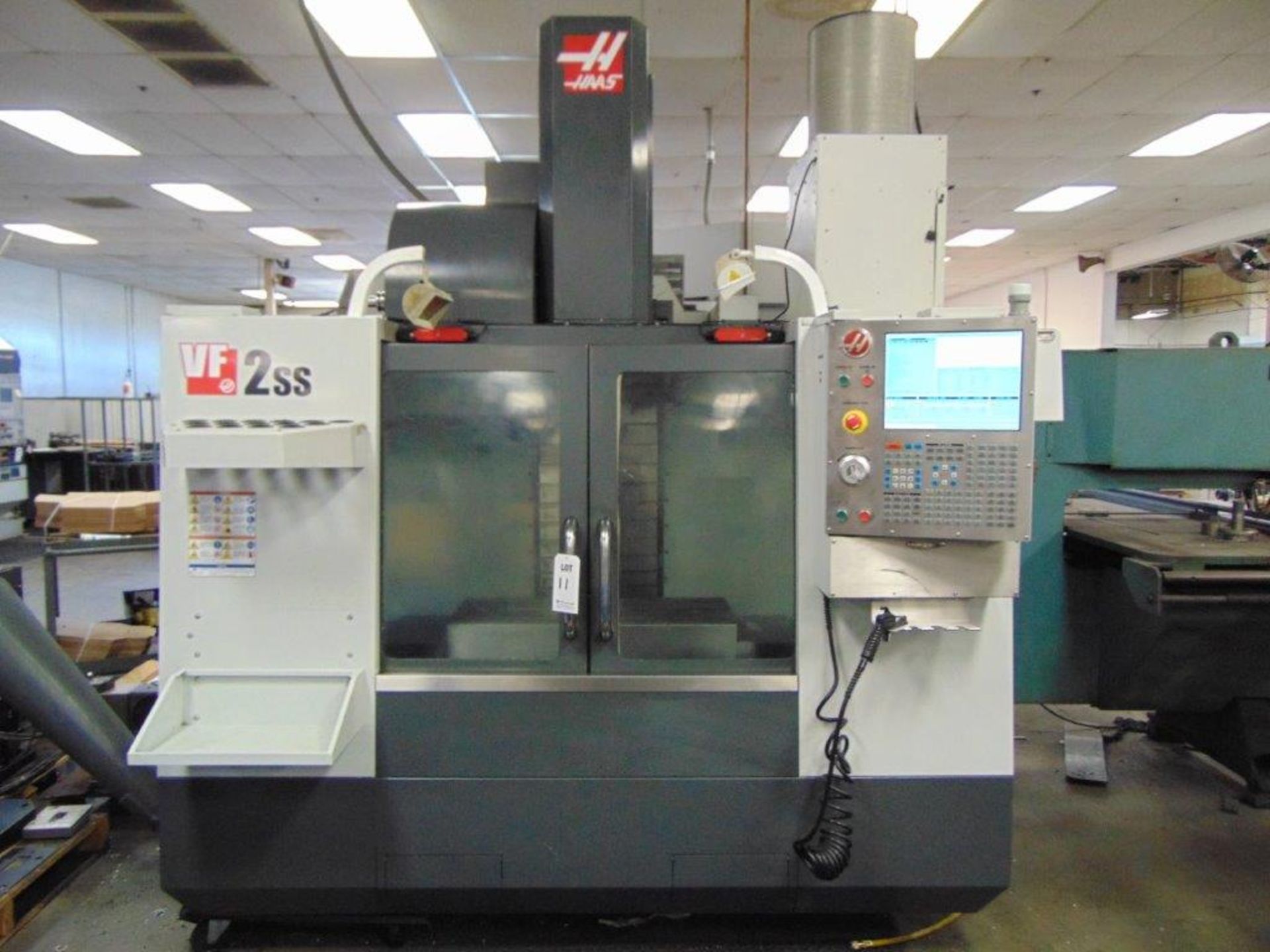 2012 HAAS VF-2SS CNC VERTICAL MACHINING CENTER, S/N 1097466, 30" x 16" x 20"TRAVELS, 30HP, 12,000RPM