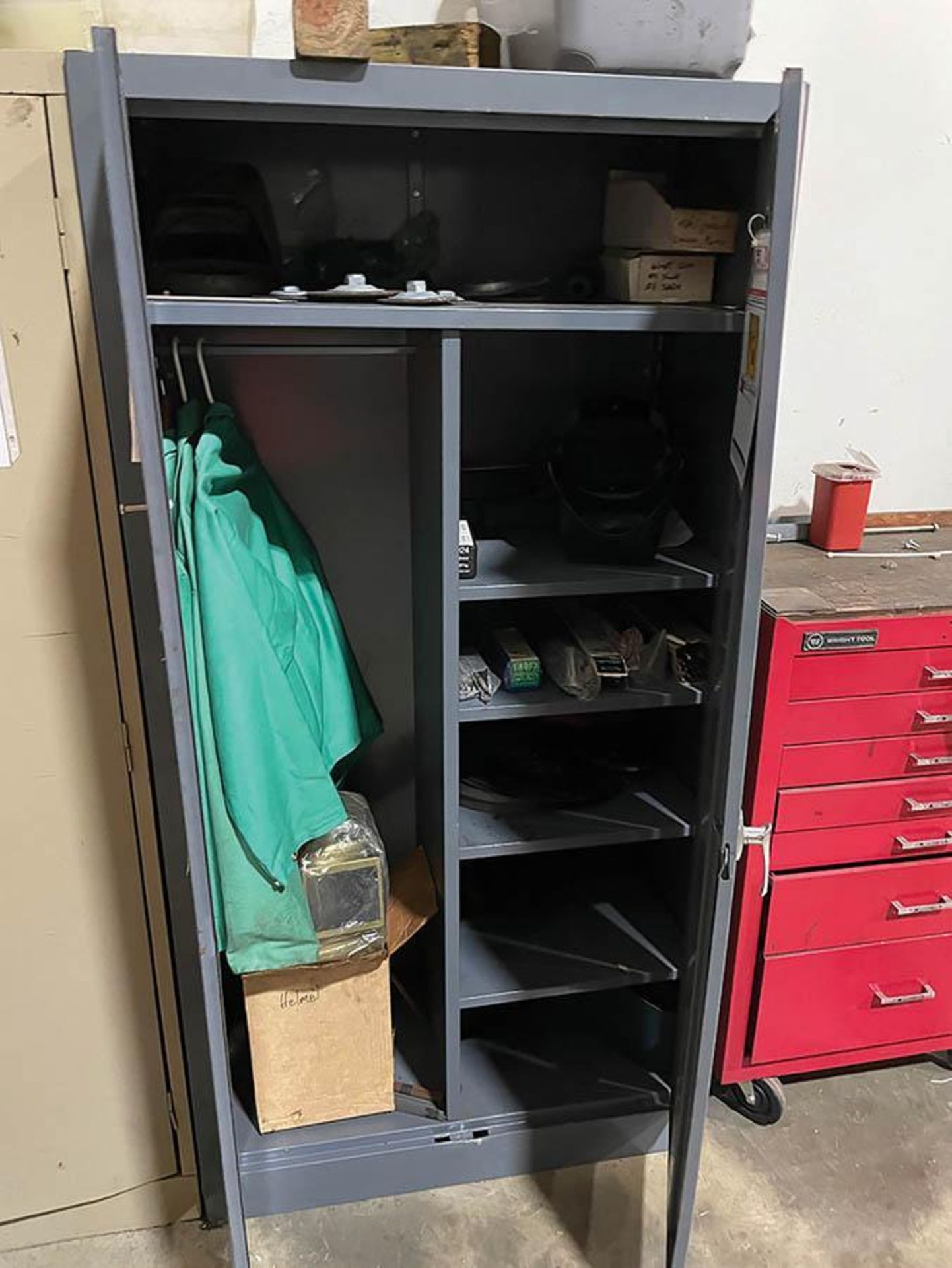 2-DOOR CABINET W/ WELDING ACCESSORIES, (3) WELDING HELMETS, ELECTRODES, JACKETS, AND (2) WELDING CUR