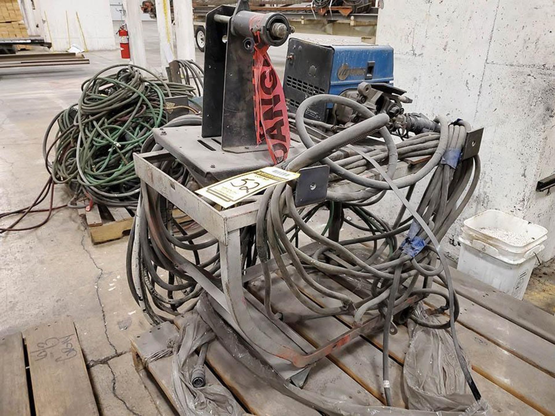 MILLER 60 SERIES 24V WIRE FEEDER WITH REEL ON ROLLING CART WITH GROUNDS, LEADS & HEAD