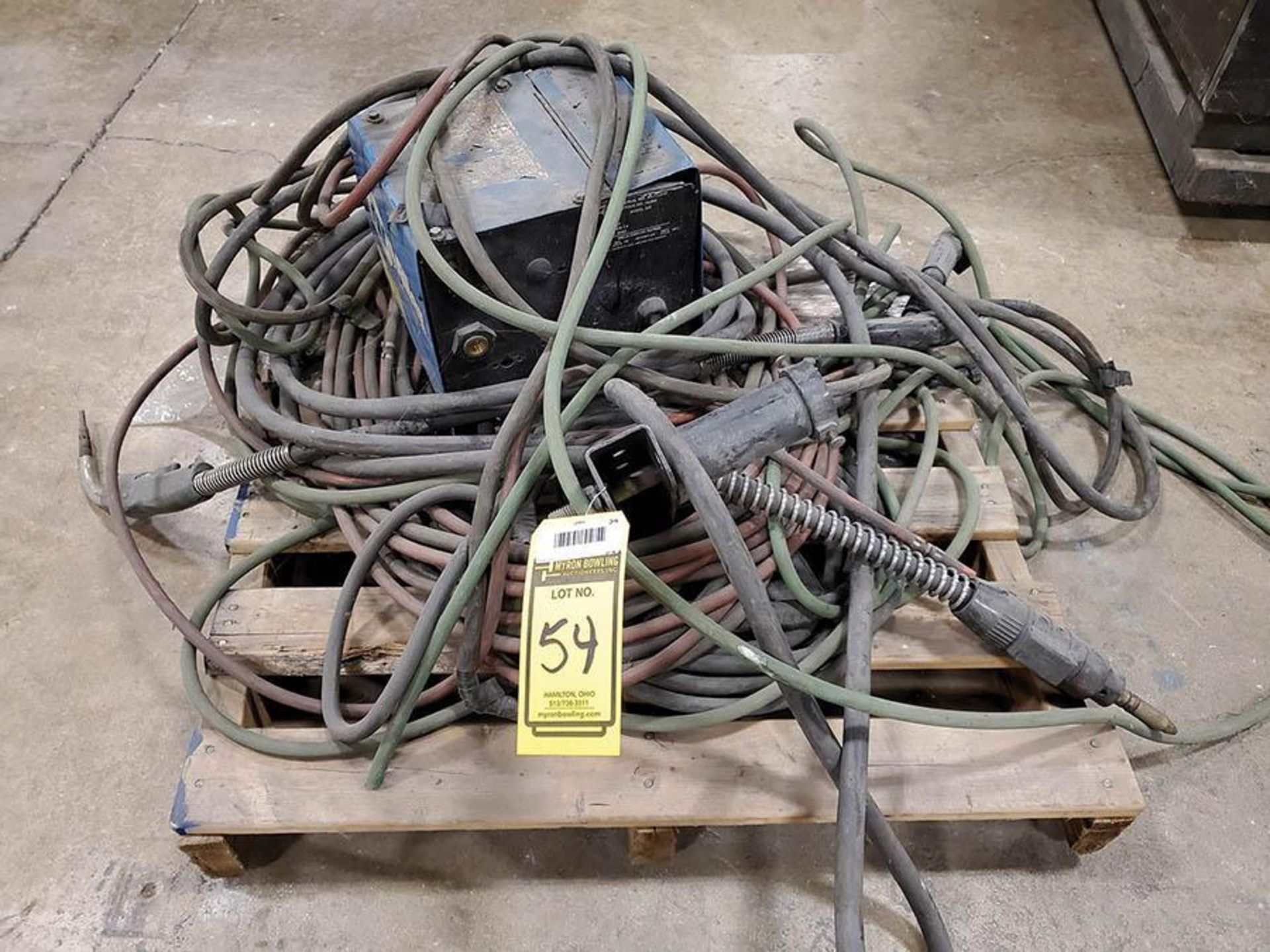 PALLET WITH MILLER WIRE FEEDER, LEADS HEADS, HOSE