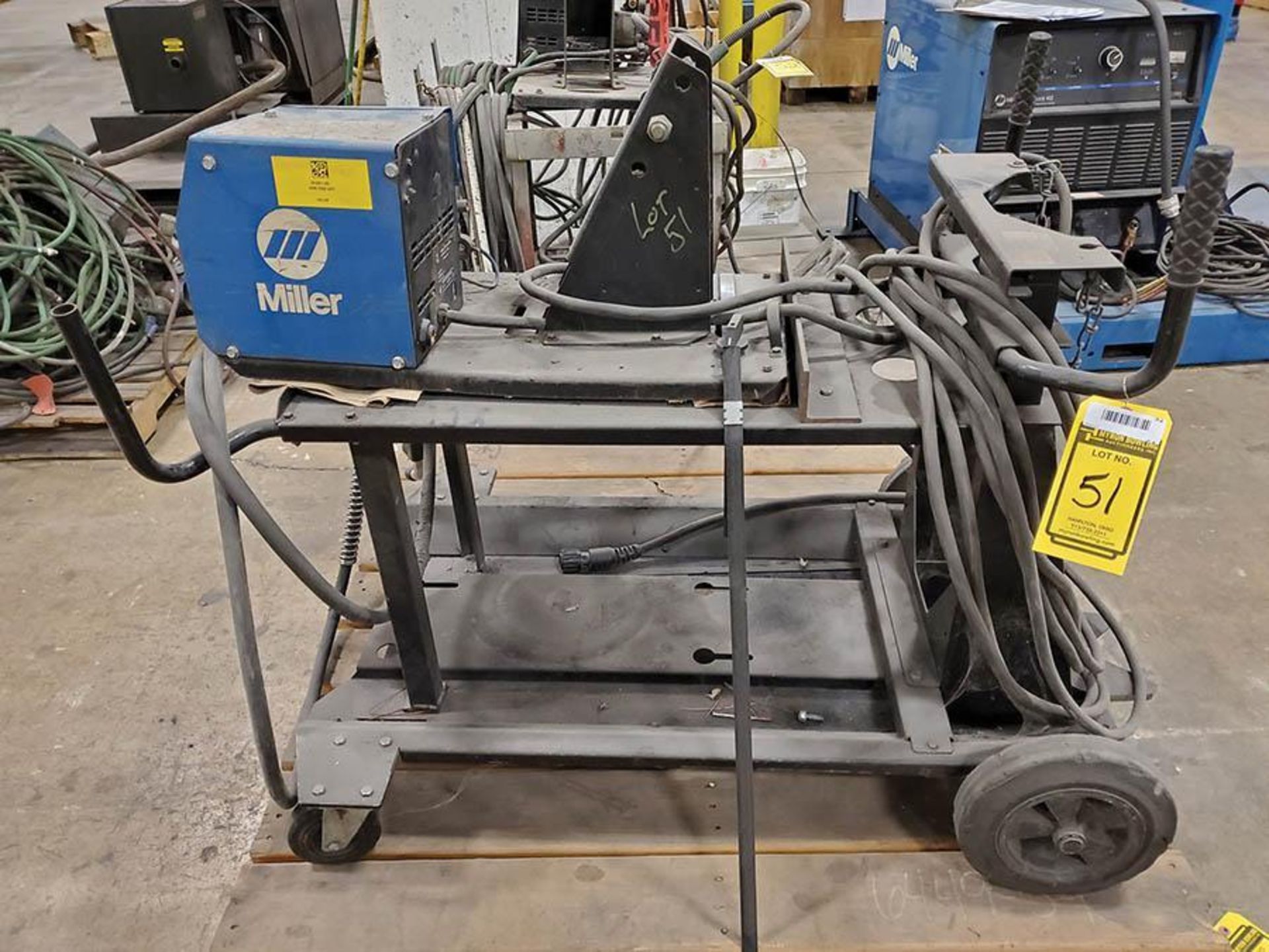 MILLER 60 SERIES 24V WIRE FEEDER WITH REEL ON ROLLING CART WITH GROUNDS, NO HEAD, SOME LEAD