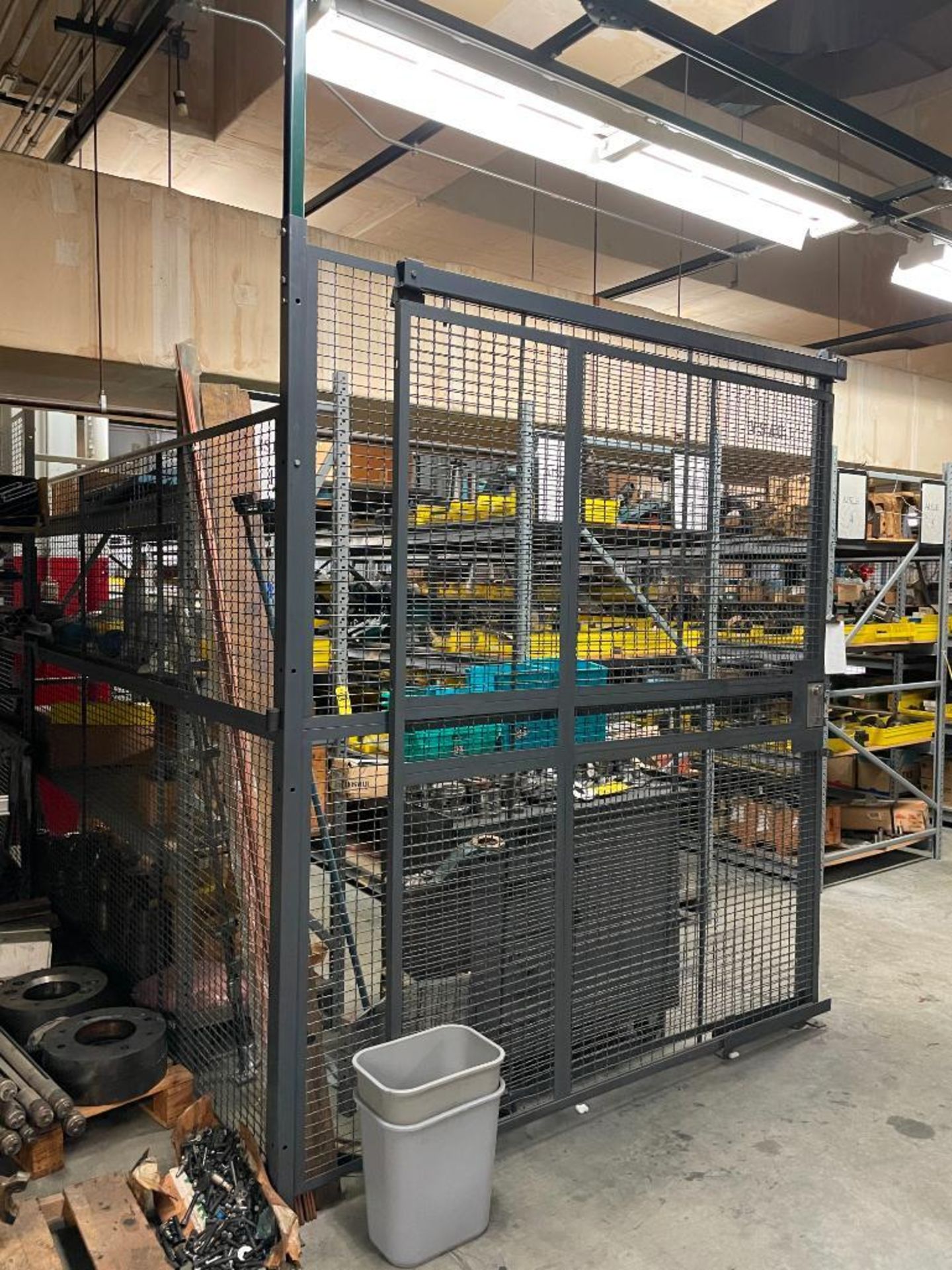 PARTS CAGE AND CONTENTS, (13) BAYS OF ASSORTED SHELVING, 75' OF 8' CAGE, CONTENTS OF SHELVING INCL.,