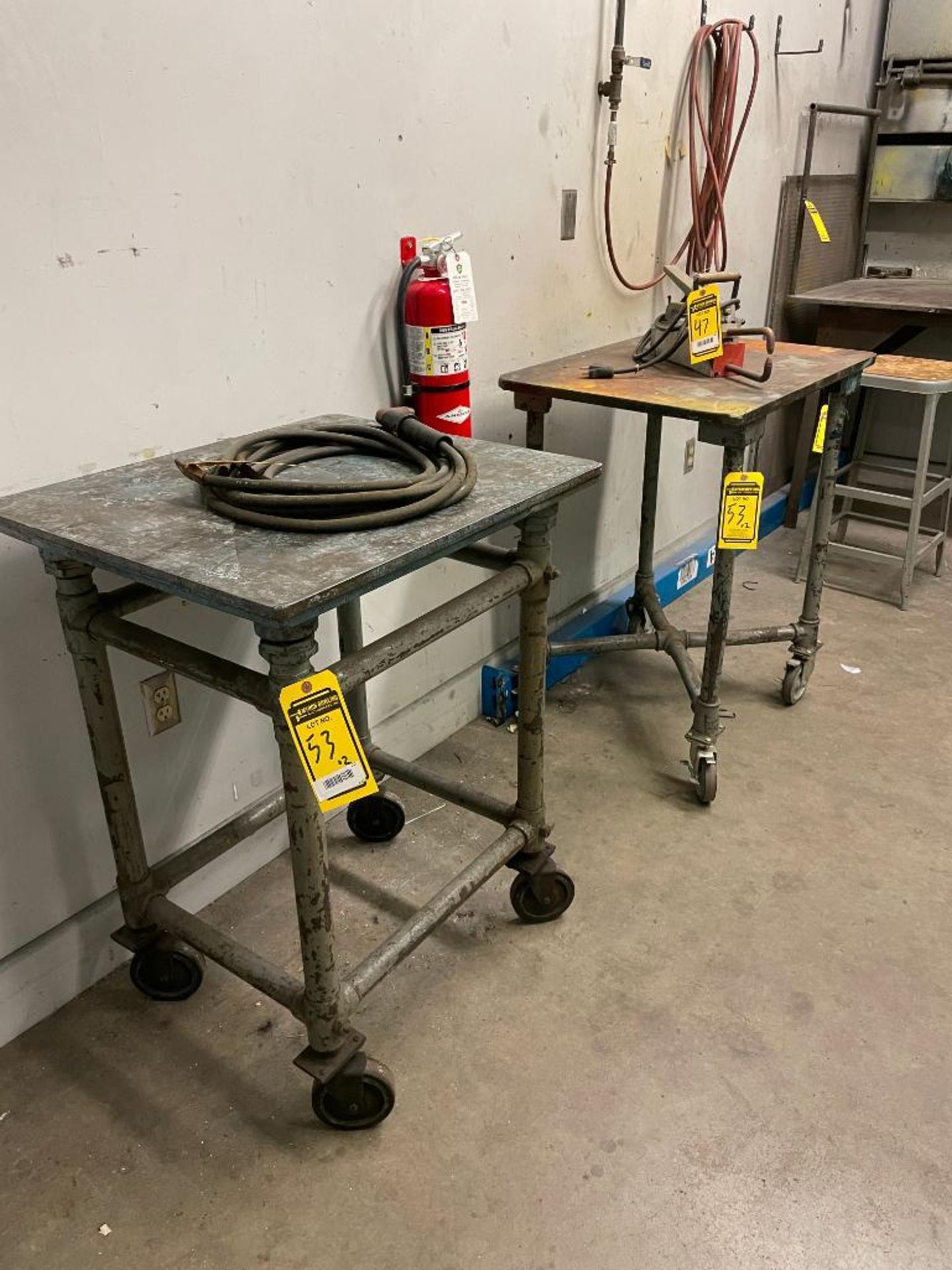 (2) HEAVY DUTY STEEL ROLLING TABLES, 2' X 2.5' X 3'