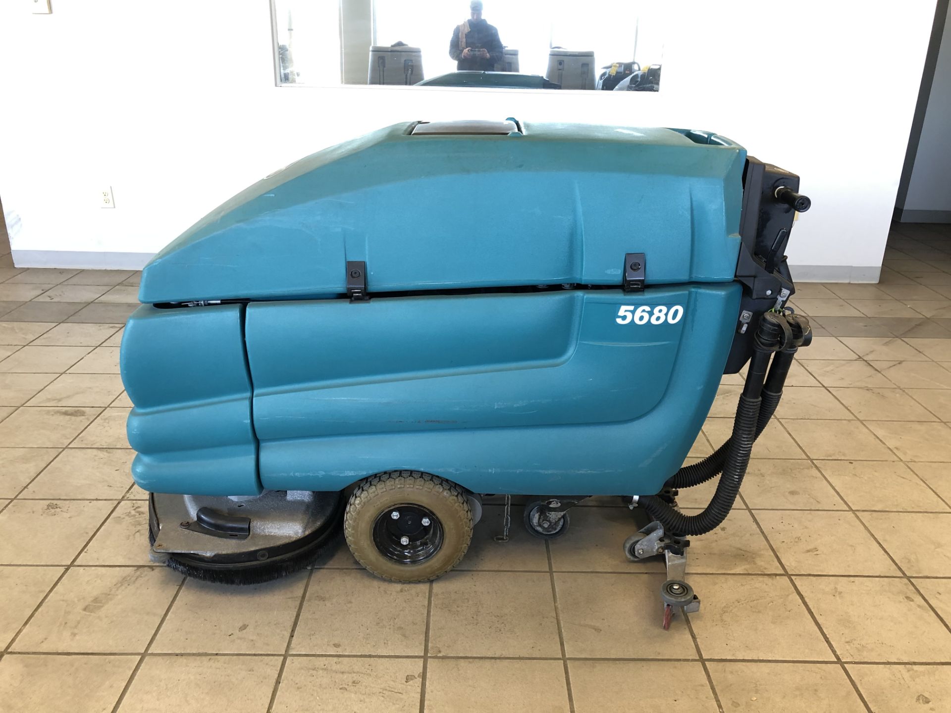 TENNANT WALK-BEHIND FLOOR SCRUBBER, MODEL: M5680, S/N: 5680-10614345, 1,211 HOURS, 36-VOLT