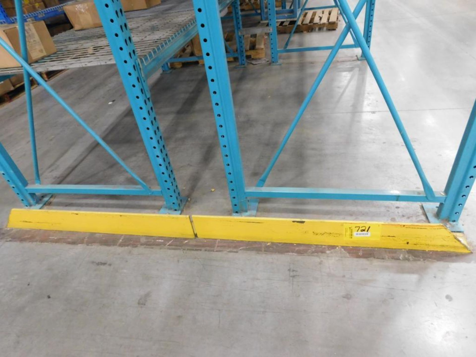 4'' X 6'' GUARDRAIL IN FRONT & BACK OF 22 ROWS OF PALLET RACKING, (8) 9', (14) 8', TOTAL OF 184'
