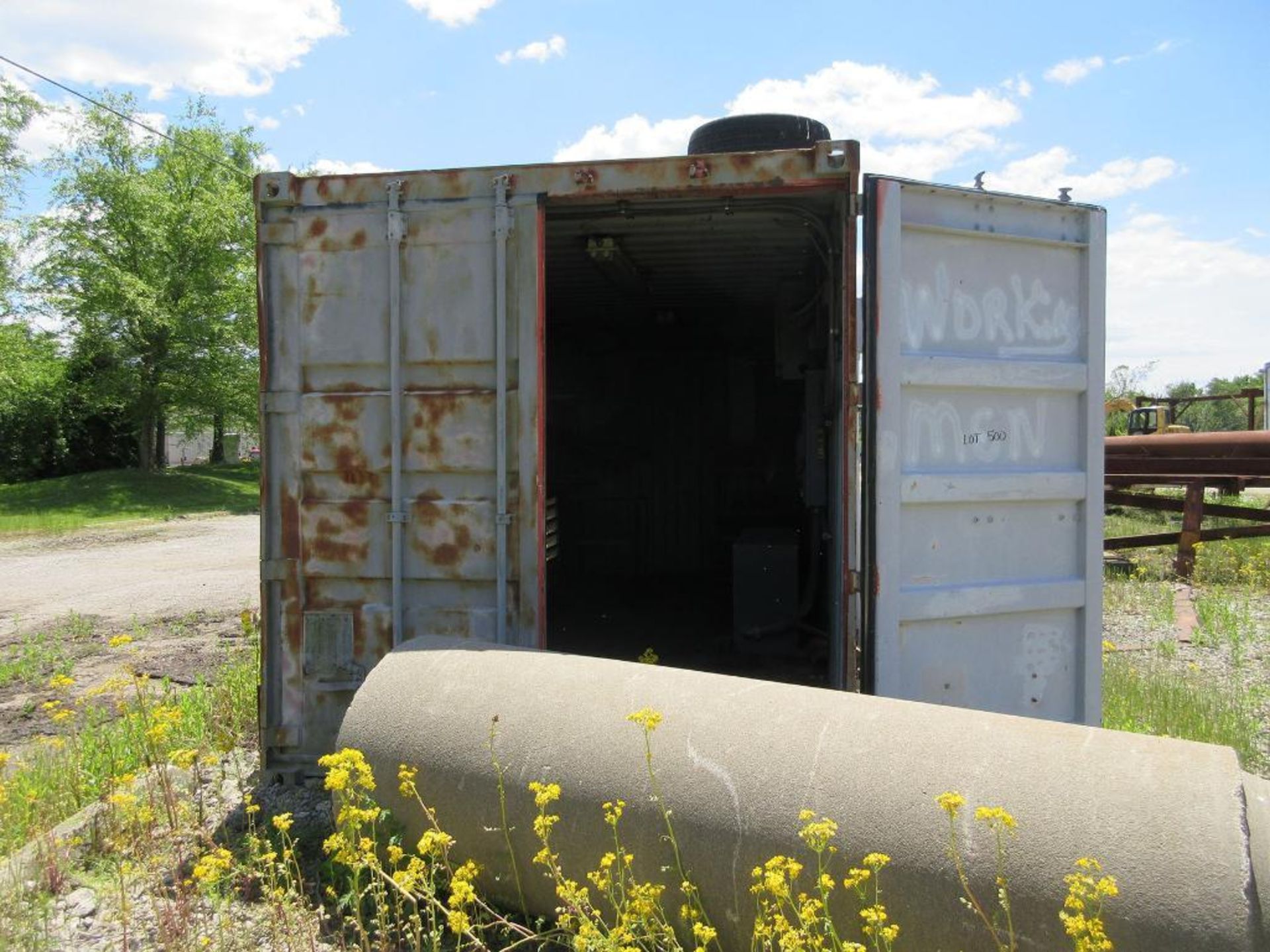 20' SHIPPING CONTAINER W/ CONTENTS: (2) SQUARE D 30 KVA TRANSFORMERS, (5) SAFETY SWITCHES,
