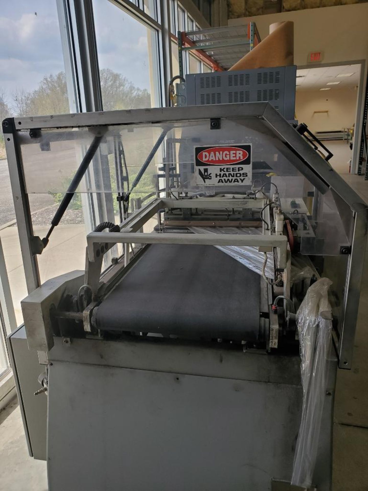 CLAMCO WRAPPING AND SEALING MACHINE; MODEL 6600, S/N 66058, SINGLE PHASE, 20-AMPS, 60-CYCLE *** - Image 4 of 5