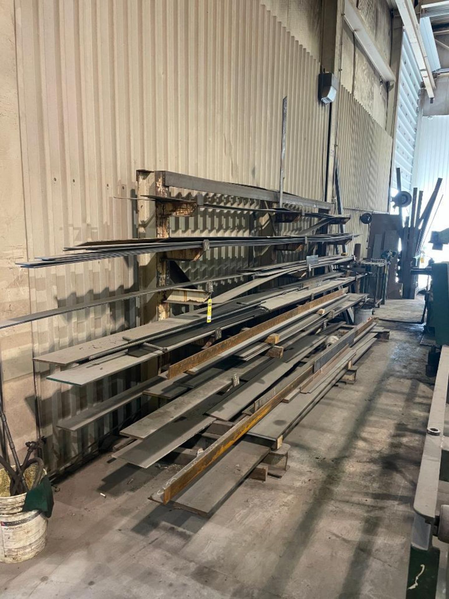 20' STOCK RACK AND CONTENTS OF STOCK MATERIAL INCL. ANGLE AND BAR STOCK