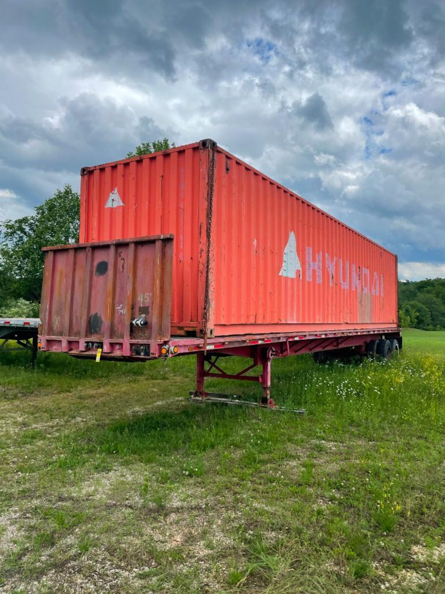 AMERICAN 45' STEEL FLATBED TRAILER, DUAL TANDEM AXLE, WOOD DECK, W/ HEADACHE RACK, VIN#J90037335,