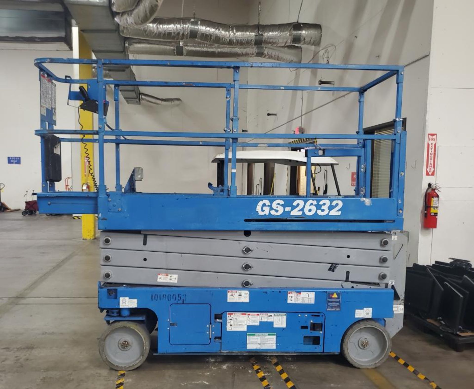 GENIE 32' SCISSOR LIFT; MODEL GS-2632, EXTENDED PLATFORM, 110-VOLT CHARGER