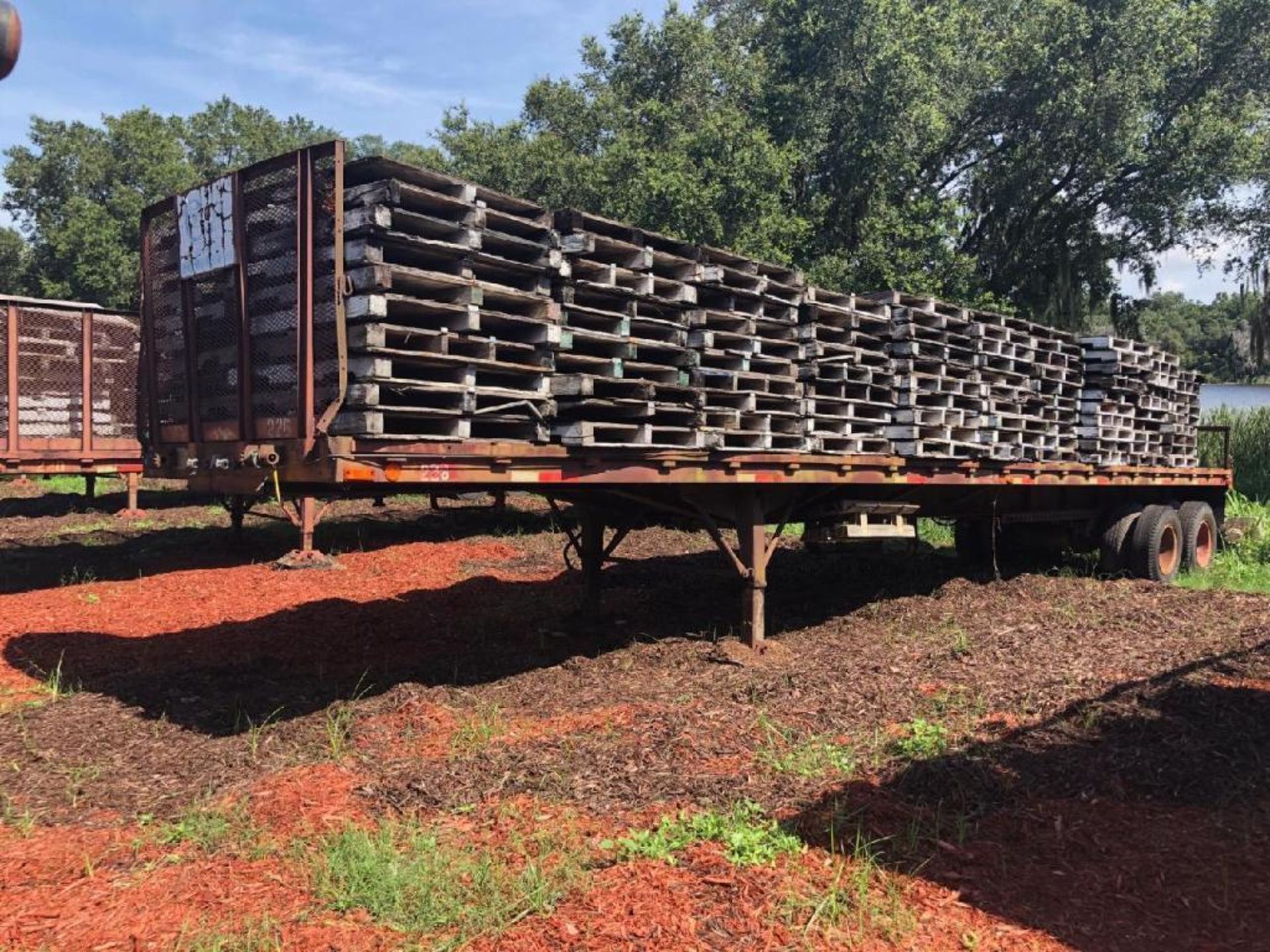 1988 MILLER P2422 42' FLATBED TRAILER, GVWR 68,080 LB., 19,040 AXLES, SLIDING TANDEM AXLE, ALUMINUM