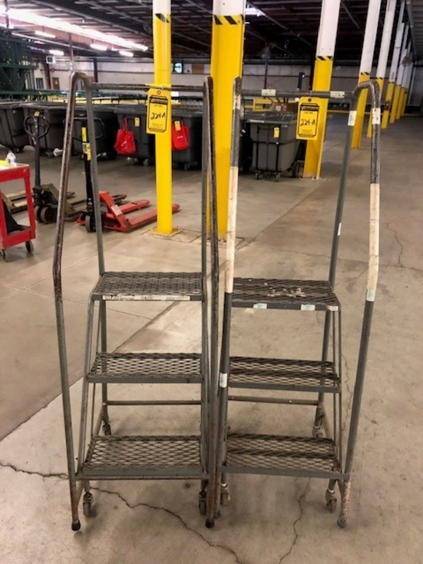 (2) TRI-ARC ROLLING LADDERS