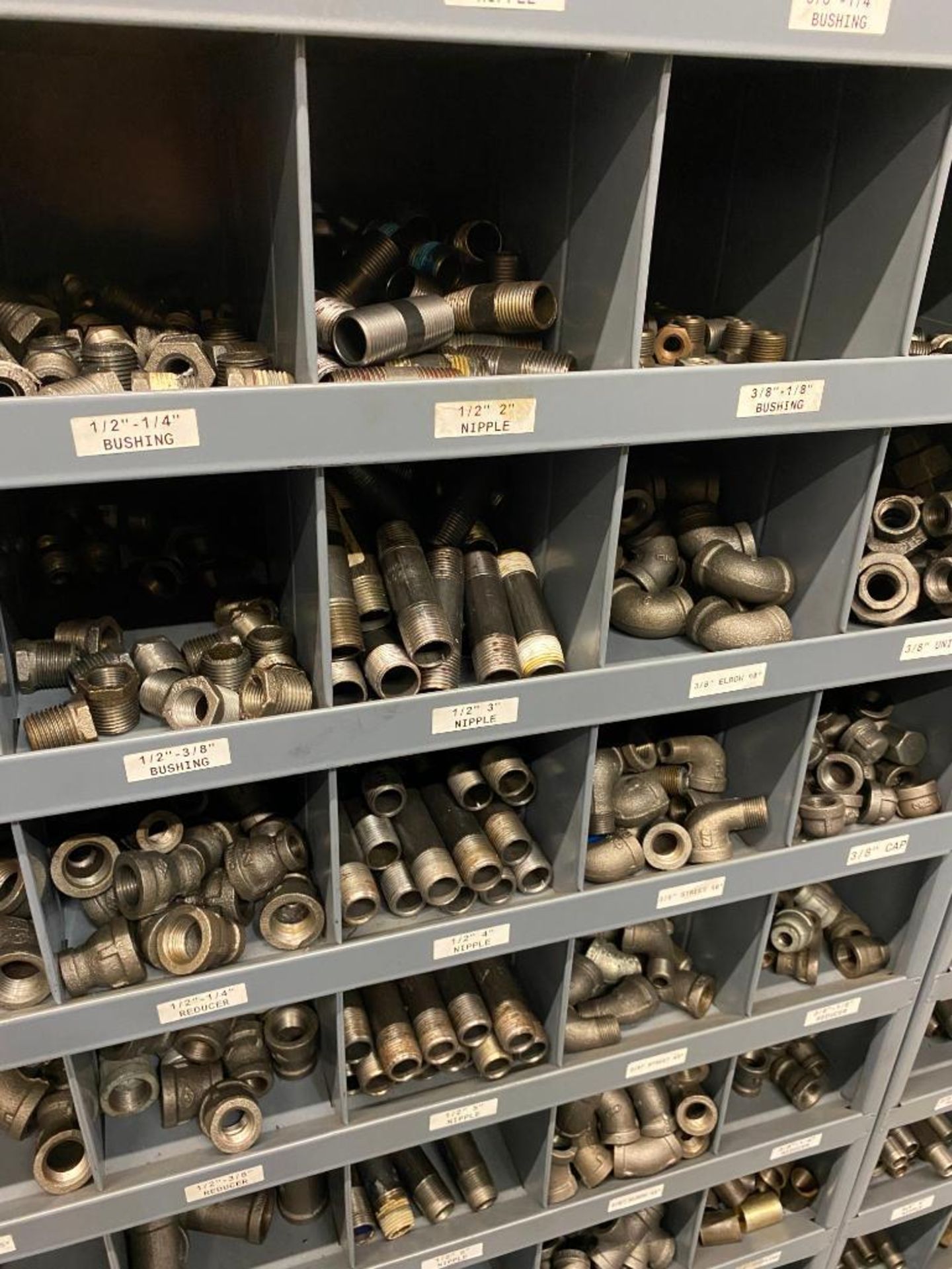 (2) SECTIONS OF PIGEONHOLE SHELVING AND CONTENTS OF ASSORTED 1/8'' - 1/2'' PIPE FITTINGS, AND CONDUI - Image 3 of 4