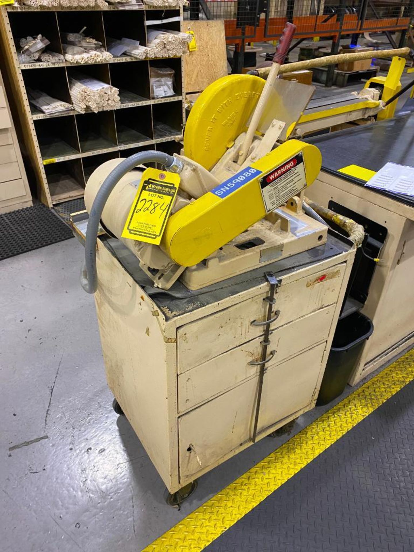 SEVER IT WITH EVERETT CHOP SAW ON 3-DRAWER CART
