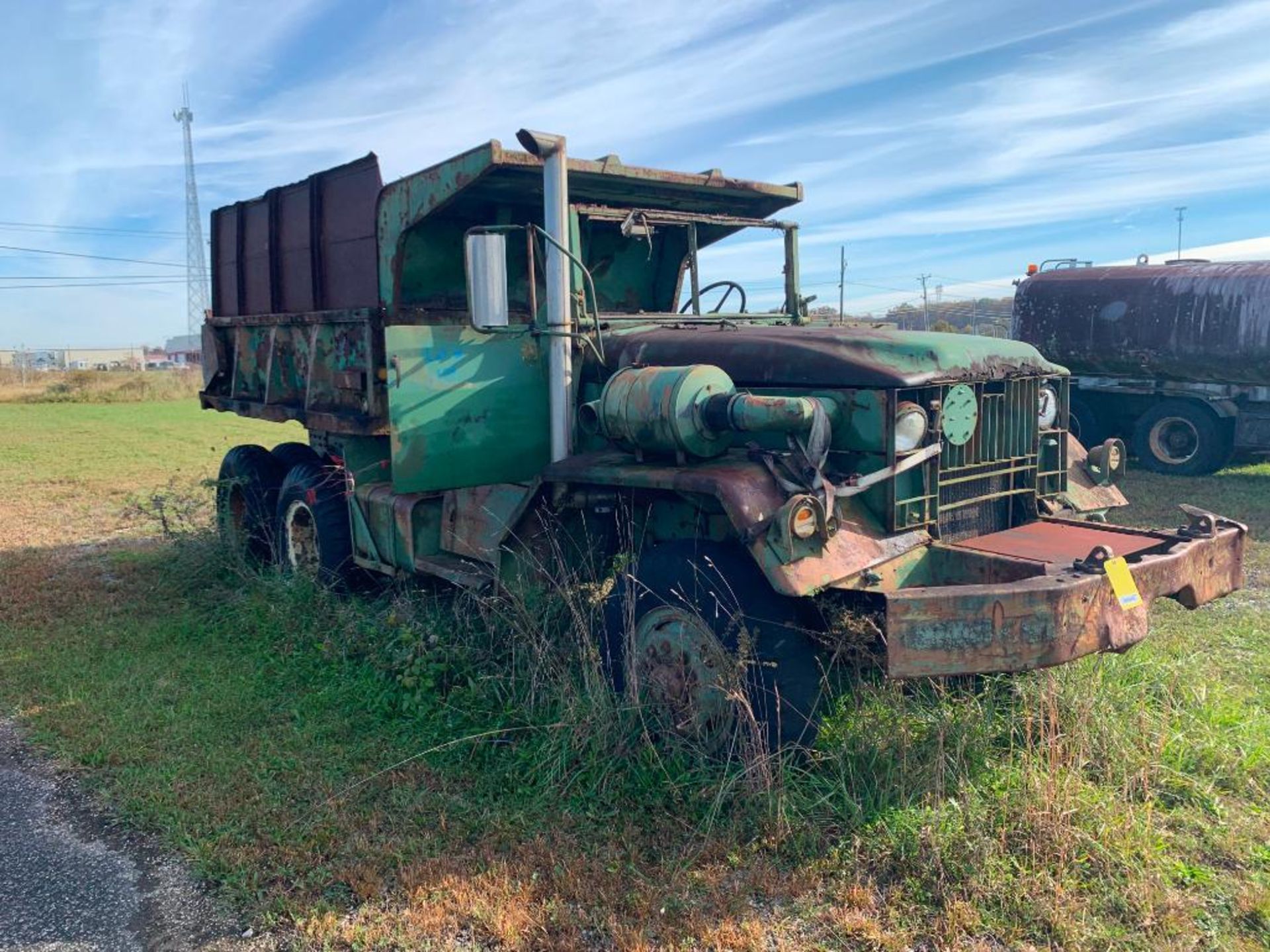 (1) MILITARY TANDEM AXLE DUMP TRUCK, ***LOCATION: 279 CW AVE, ASHLAND, KY 41102***