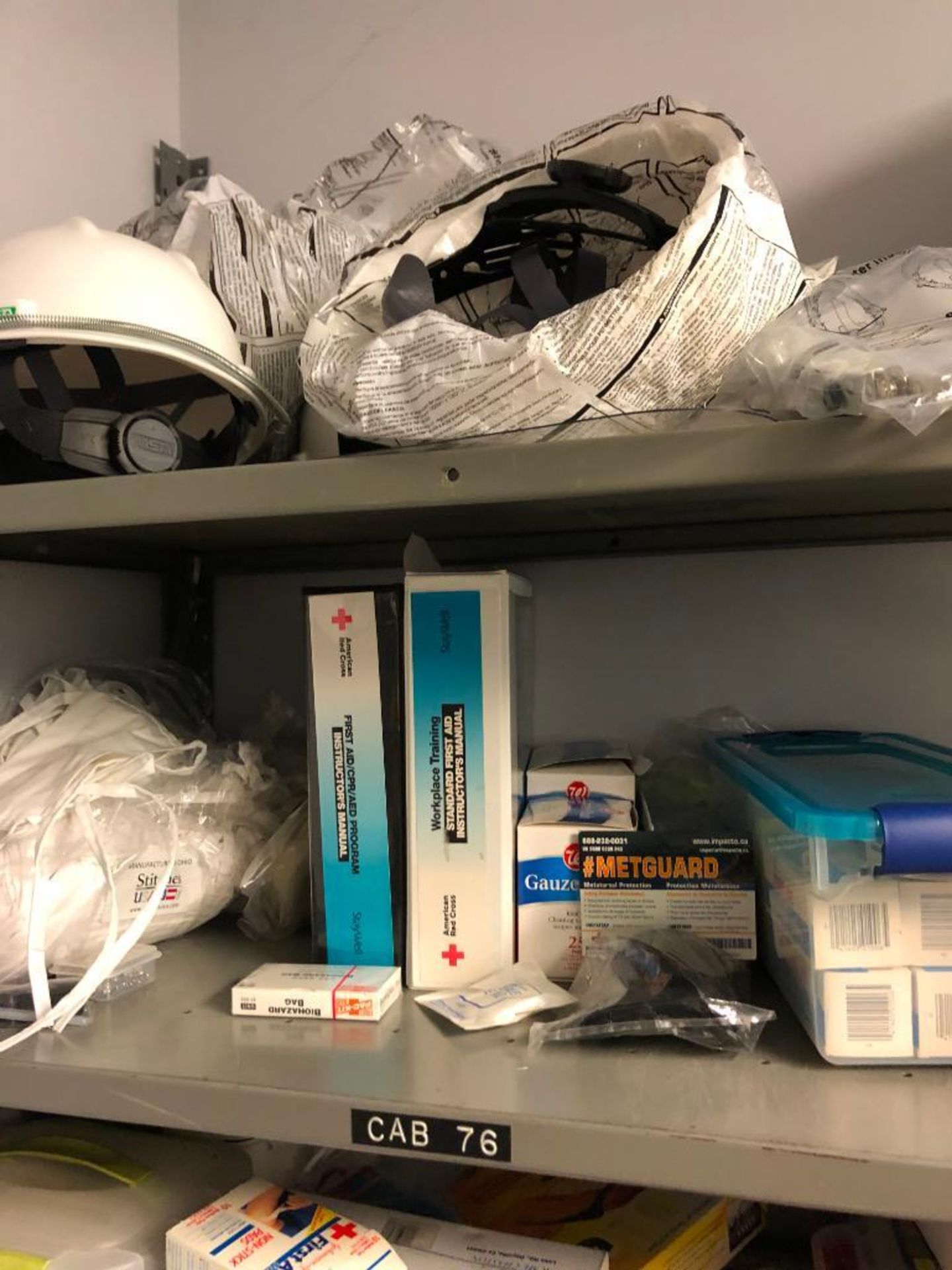 (2) SHELVES AND CONTENT: HARD HATS, FIRST AID KITS, SAFETY VEST, CPR DUMMY, MASKS, GLOVES, SAFETY GL - Image 4 of 6
