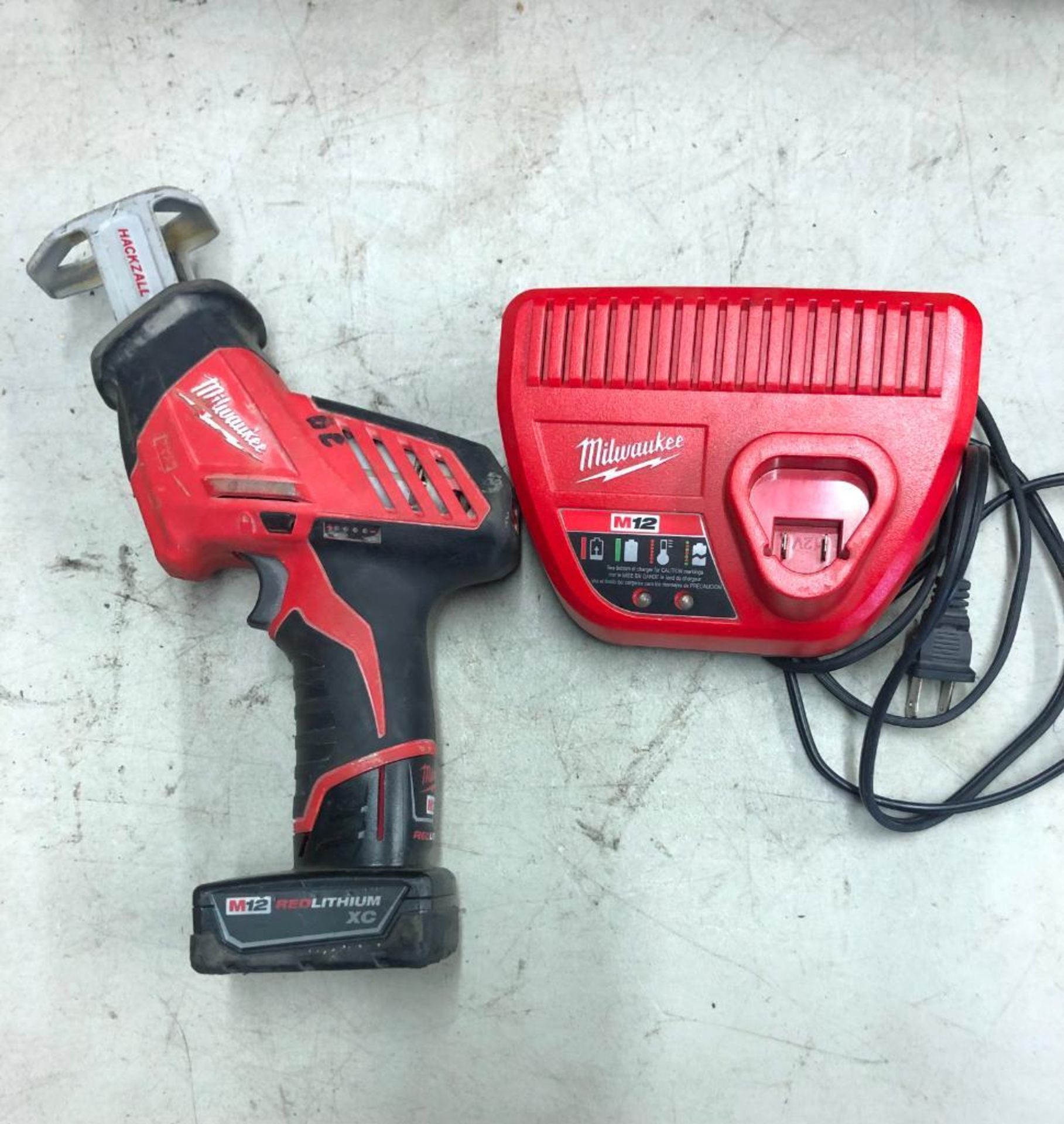 MILWAUKEE CORDLESS HACK SAW, S/N 856ED172801981, W/ (1) BATTERY AND CHARGER