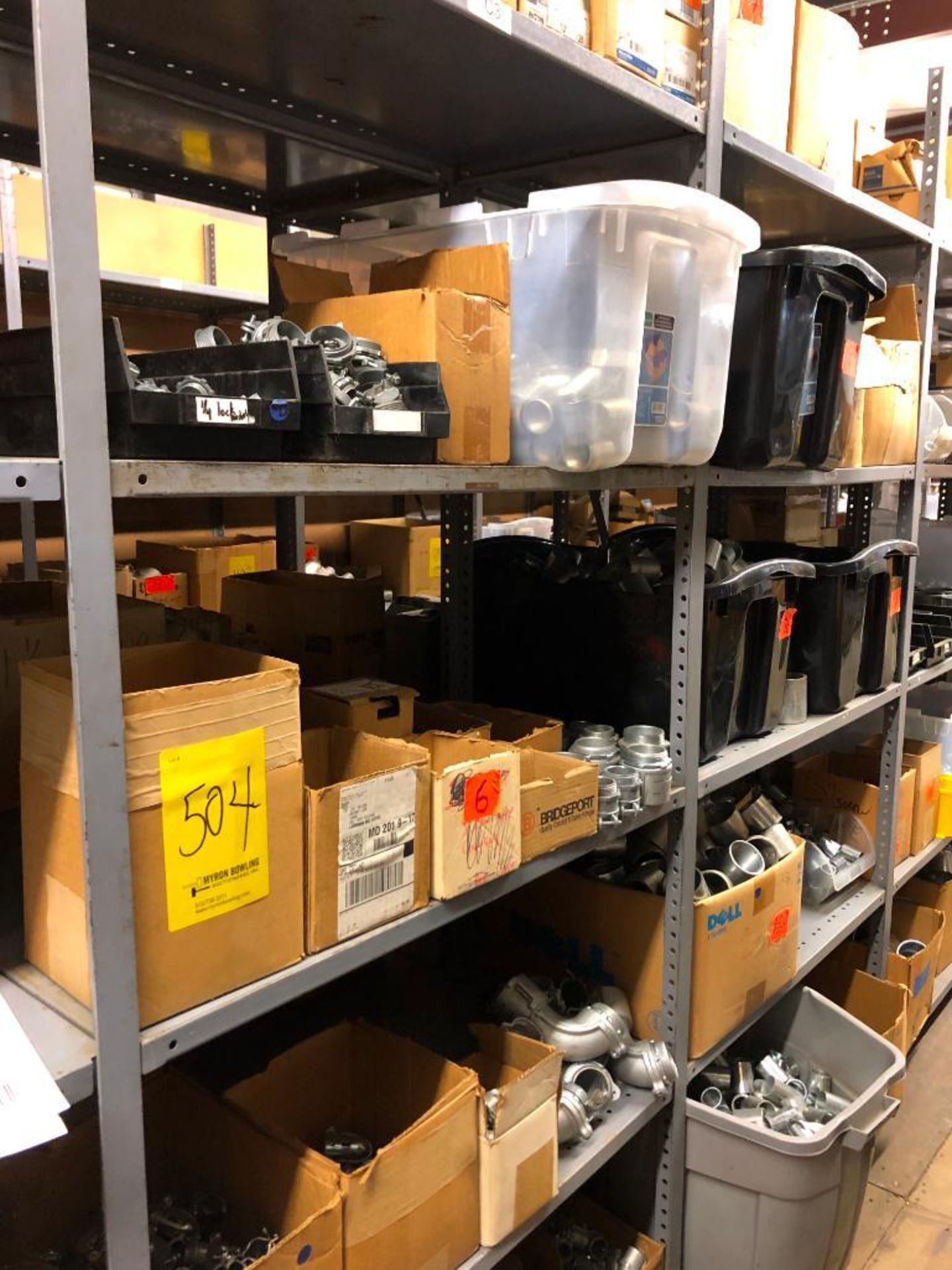 CONTENT OF SHELVES: FLEX CONNECTORS, NMC CONNECTORS, RIDGID PIPE COUPLINGS