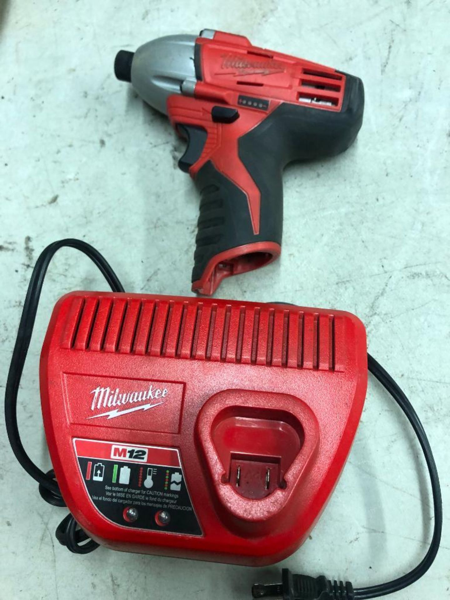 MILWAUKEE CORDLESS IMPACT DRIVER AND CHARGER
