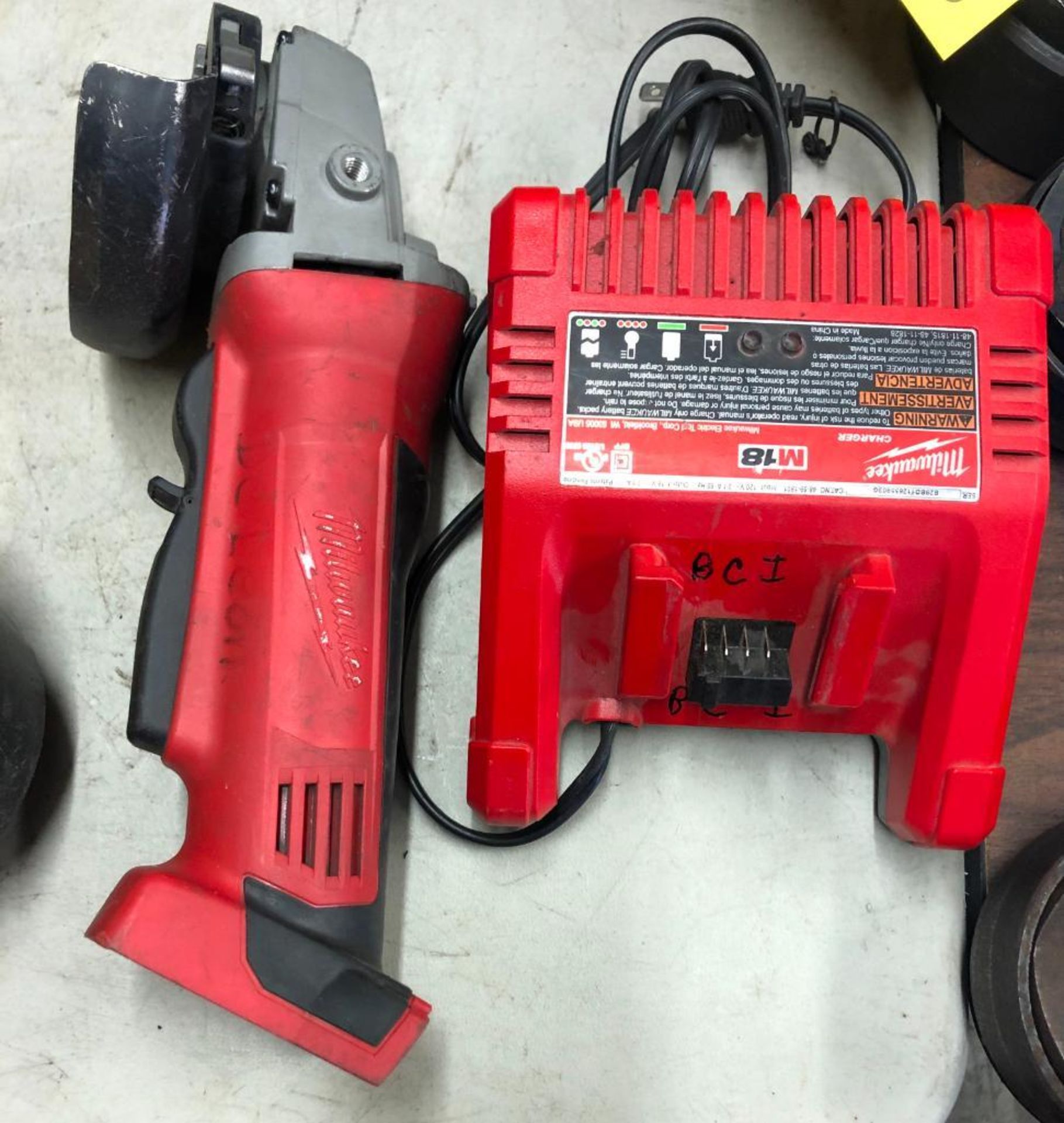 MILWAUKEE CORDLESS 4-1/2'' CUT-OFF GRINDER W/ CHARGER