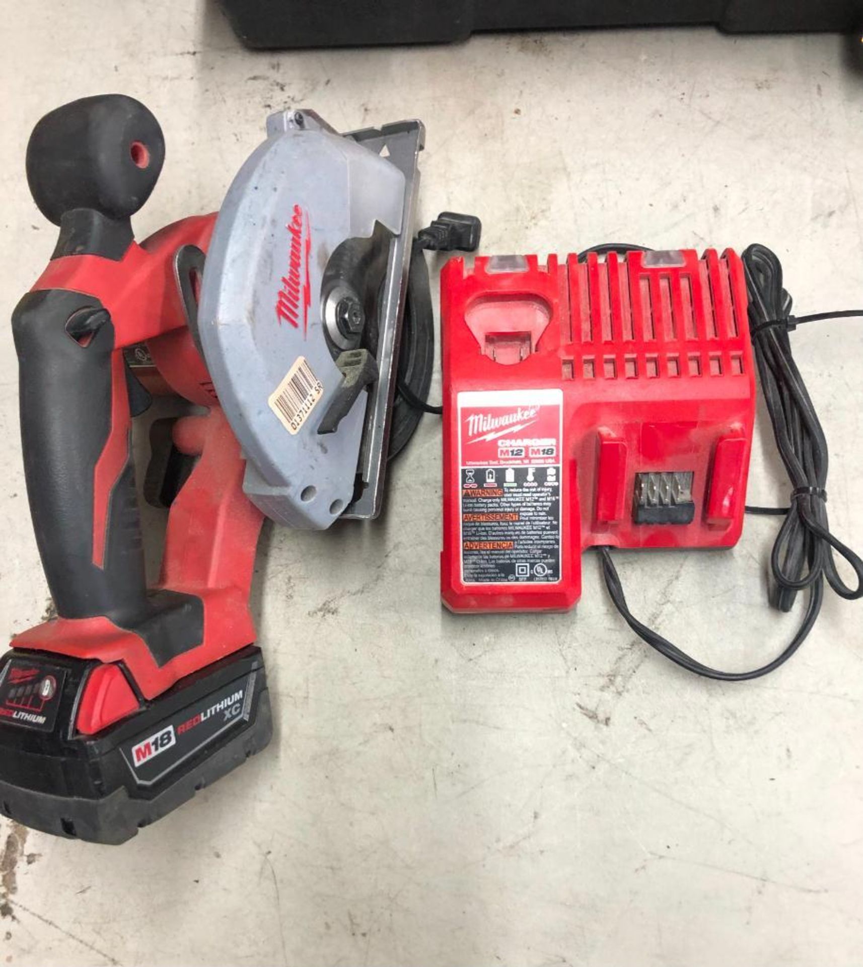 MILWAUKEE CORDLESS 5 3/8'' METAL SAW, S/N C74AD11400862, W/ (1) BATTERY AND CHARGER