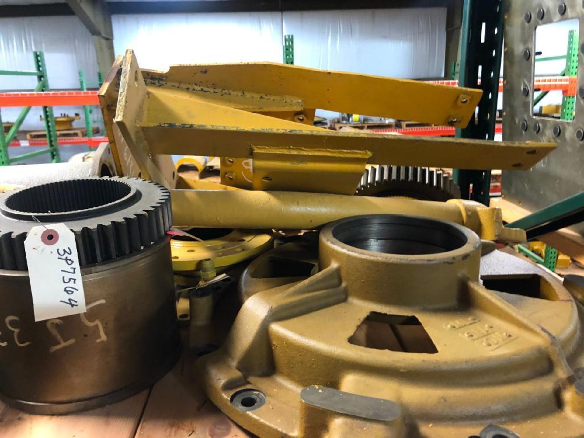 SHELF OF USED CATERPILLAR PARTS