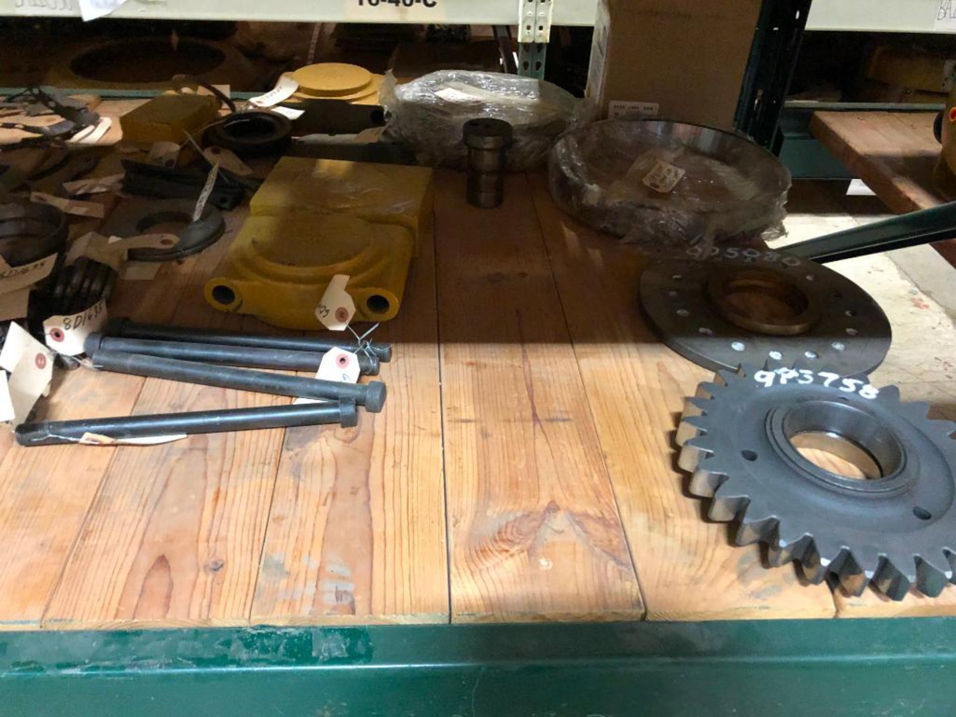 SHELF OF USED CATERPILLAR PARTS