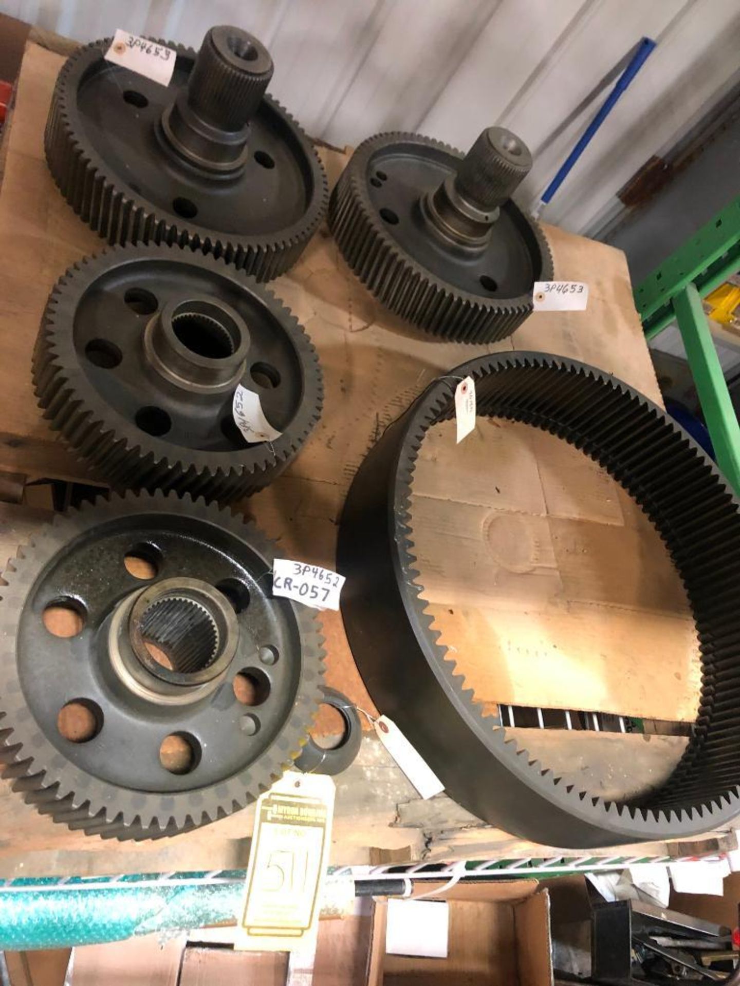 SKID OF ASSORTED PARTS CONSISTING OF: (1) GEAR, PART NUMBER 3P4652, (1) GEAR, PART NUMBER 4D1570, (2