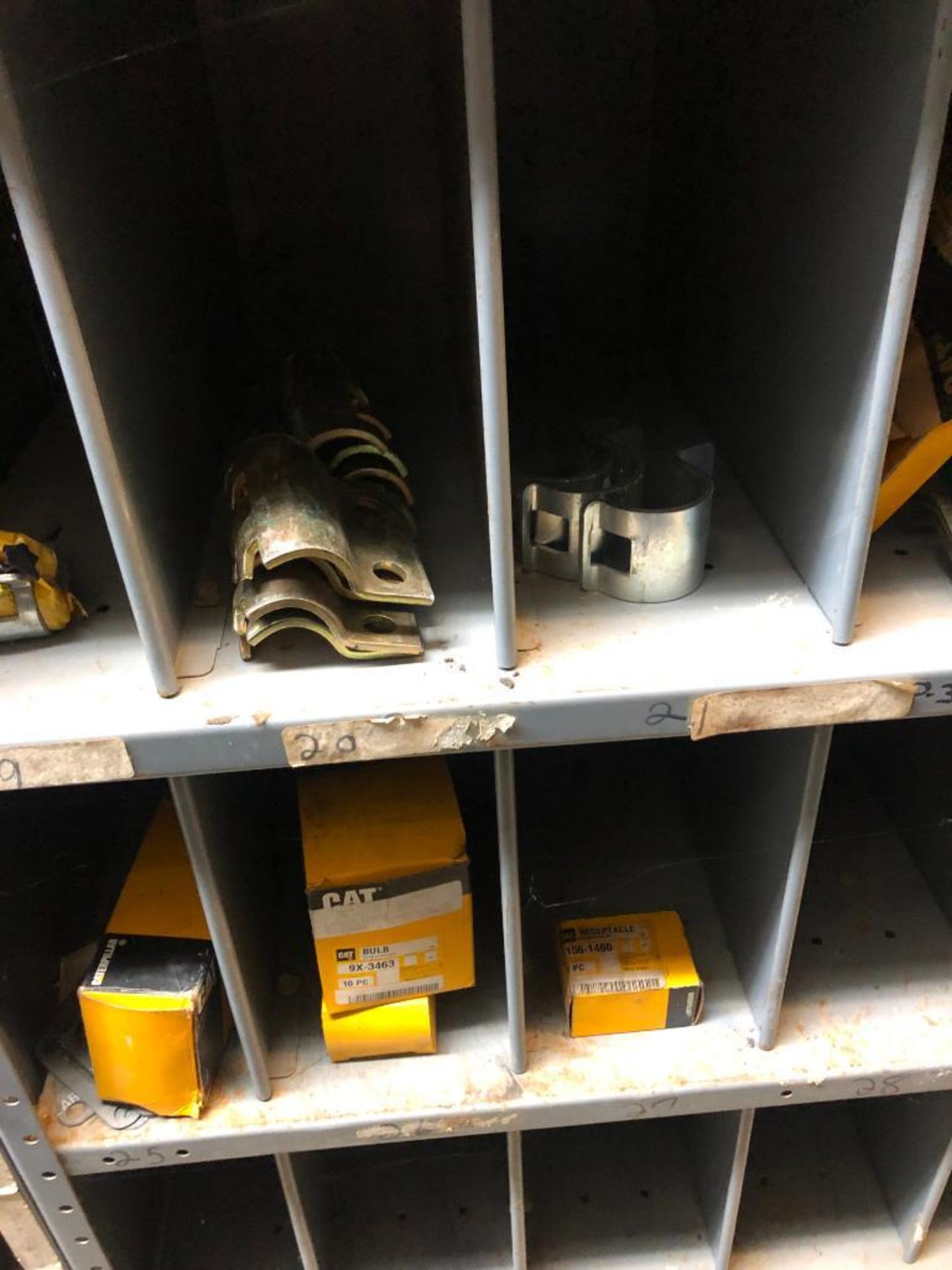 (5) ROWS OF SHELVES W/ DIVIDERS & PIGEON HOLES, SOME CONSISTING OF NEW CATERPILLAR SURPLUS - Image 13 of 25