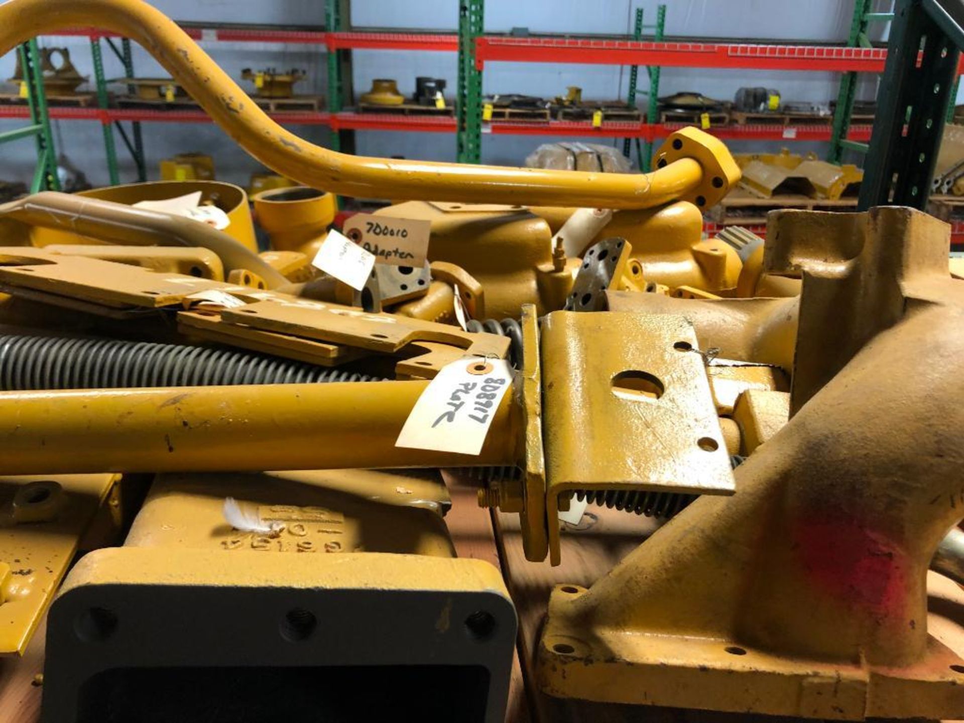 SHELF OF USED CATERPILLAR PARTS