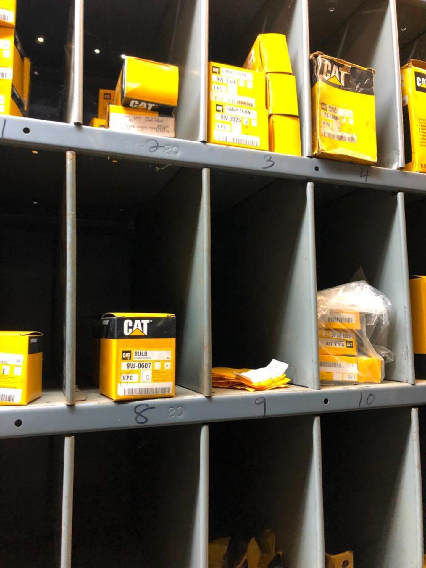 (5) ROWS OF SHELVES W/ DIVIDERS & PIGEON HOLES, SOME CONSISTING OF NEW CATERPILLAR SURPLUS - Image 2 of 25