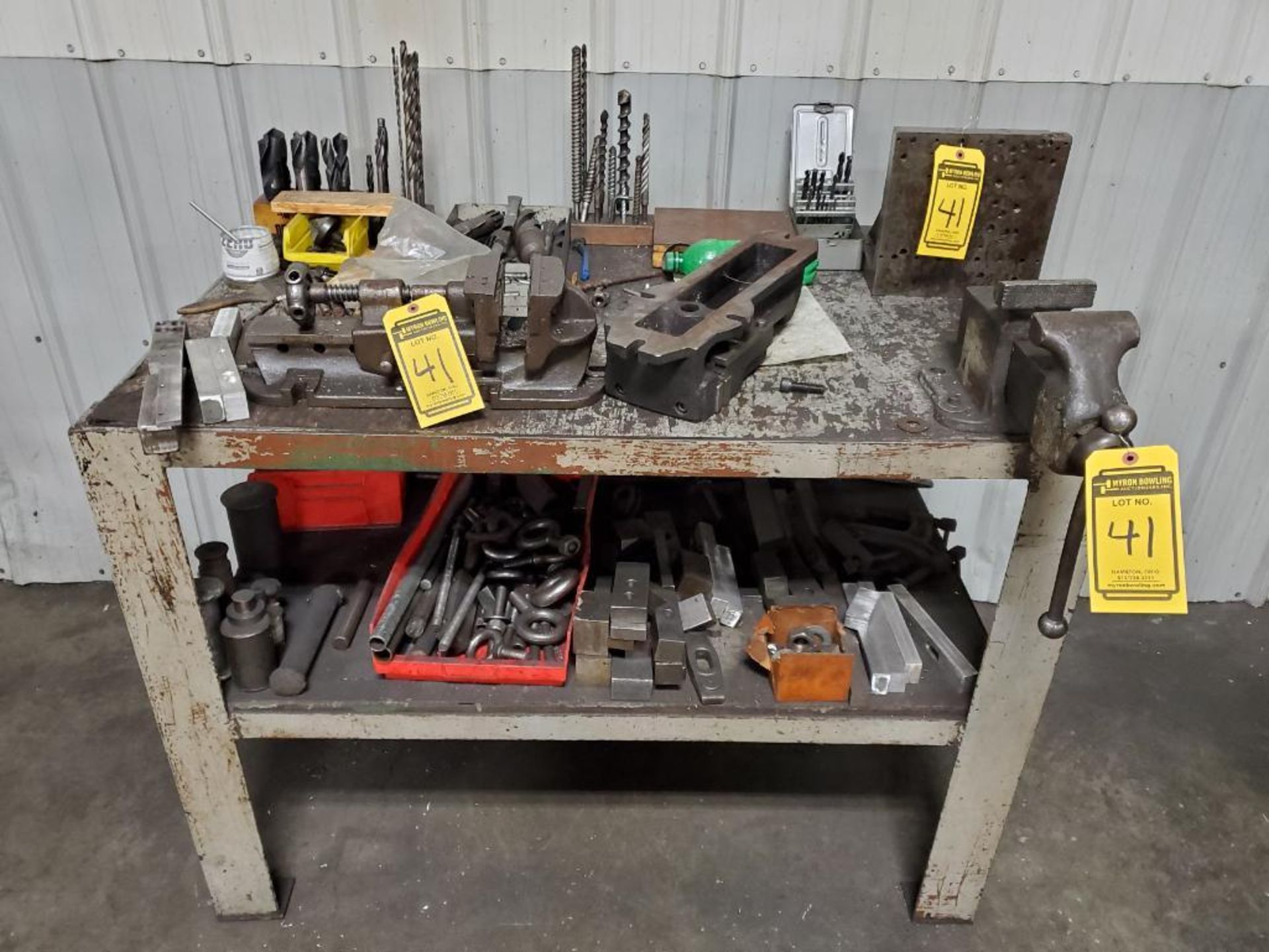 (2) STEEL TABLES, W/ BENCH VISE, ANGLE BLOCKS, EYE BOLTS, PARTS VISES, PERISHABLE TOOLING, & MORE