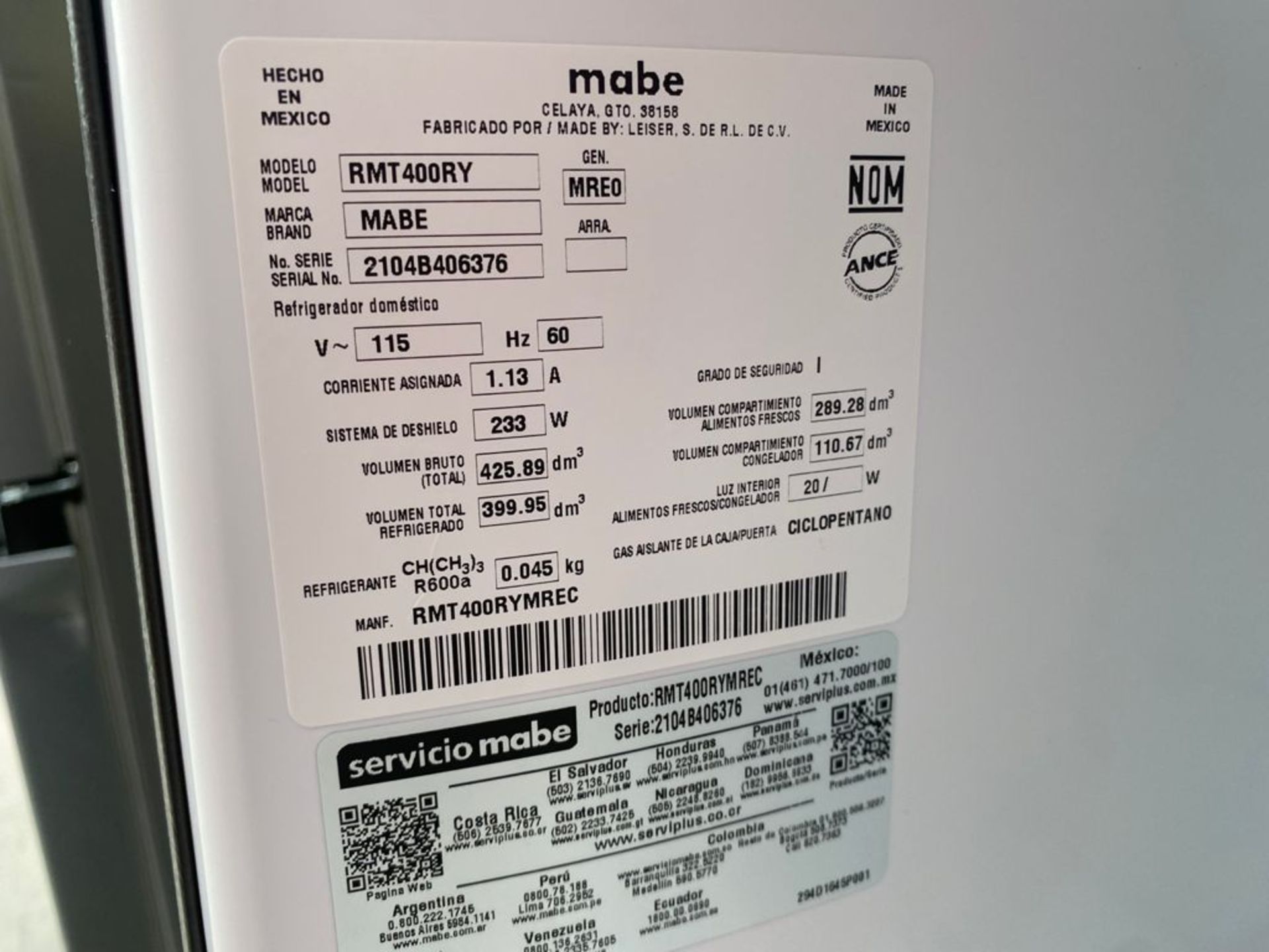 1 Refrigerador marca Mabe color gris con despachador de agua modelo RMT400RY - Image 20 of 22