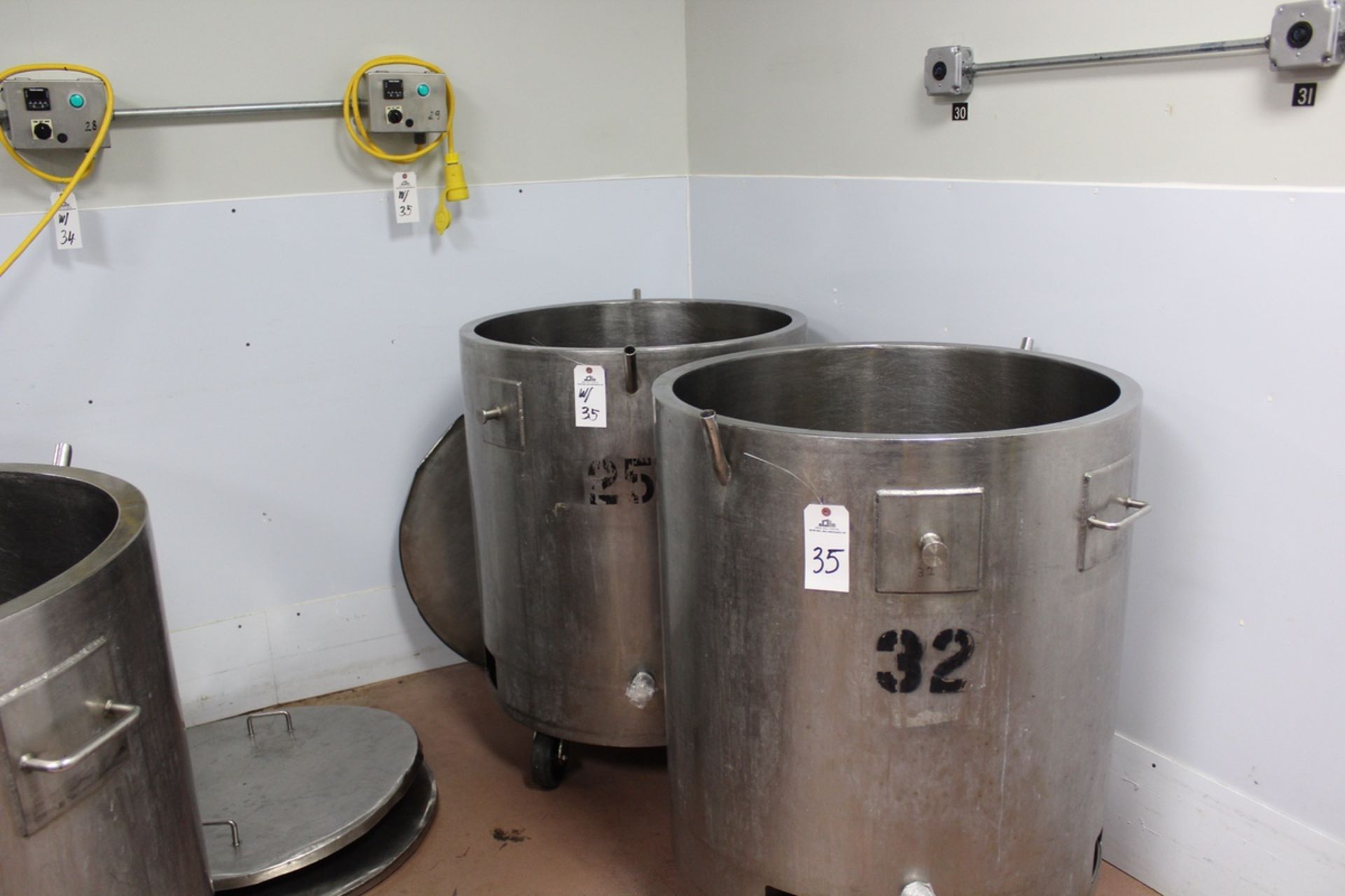(2) 75-GALLON APPROX STAINLESS SELF CONTAINED HEATED TANKS, 31.5" ID X 20" SID | Reqd Rig Fee: $50