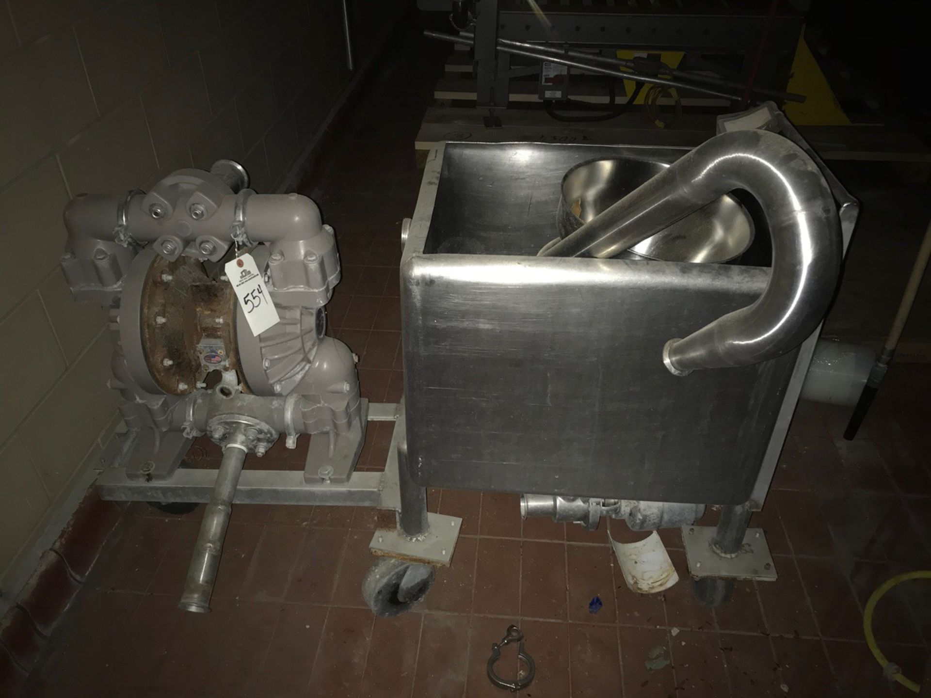 PNEUMATIC PUMP AND STAINLESS STEEL RECTANGULAR TANK. APPROX 19IN X 23IN X 19IN DEEP | Rig Fee $125