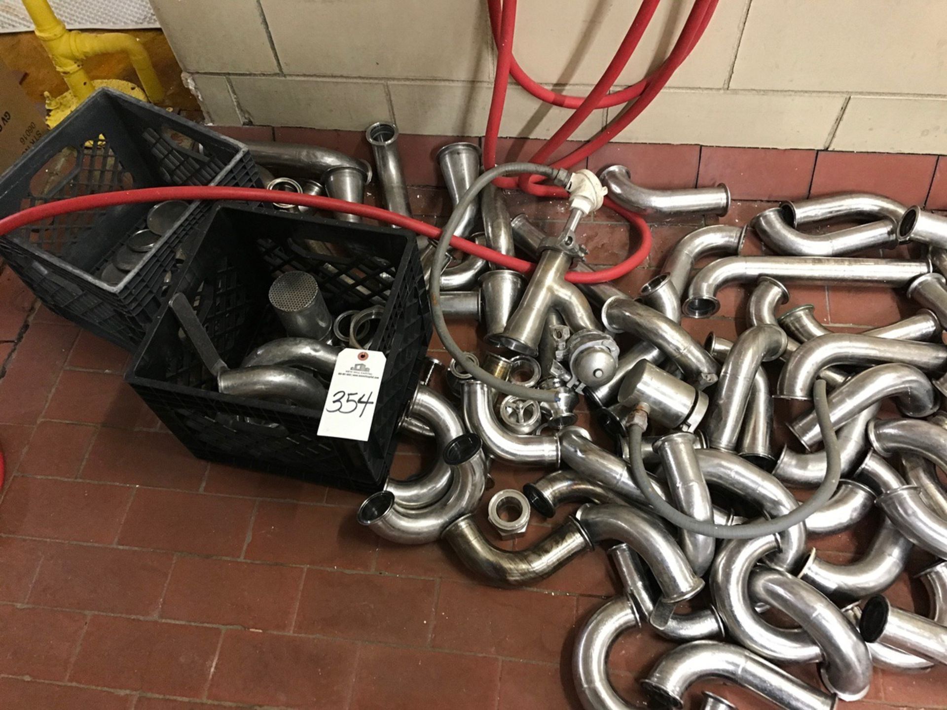 MISCELLANEOUS STAINLESS STEEL PIPE, ELBOWS, TEES, AND STRAIGHTS PLUS HANGERS | Rig Fee $50