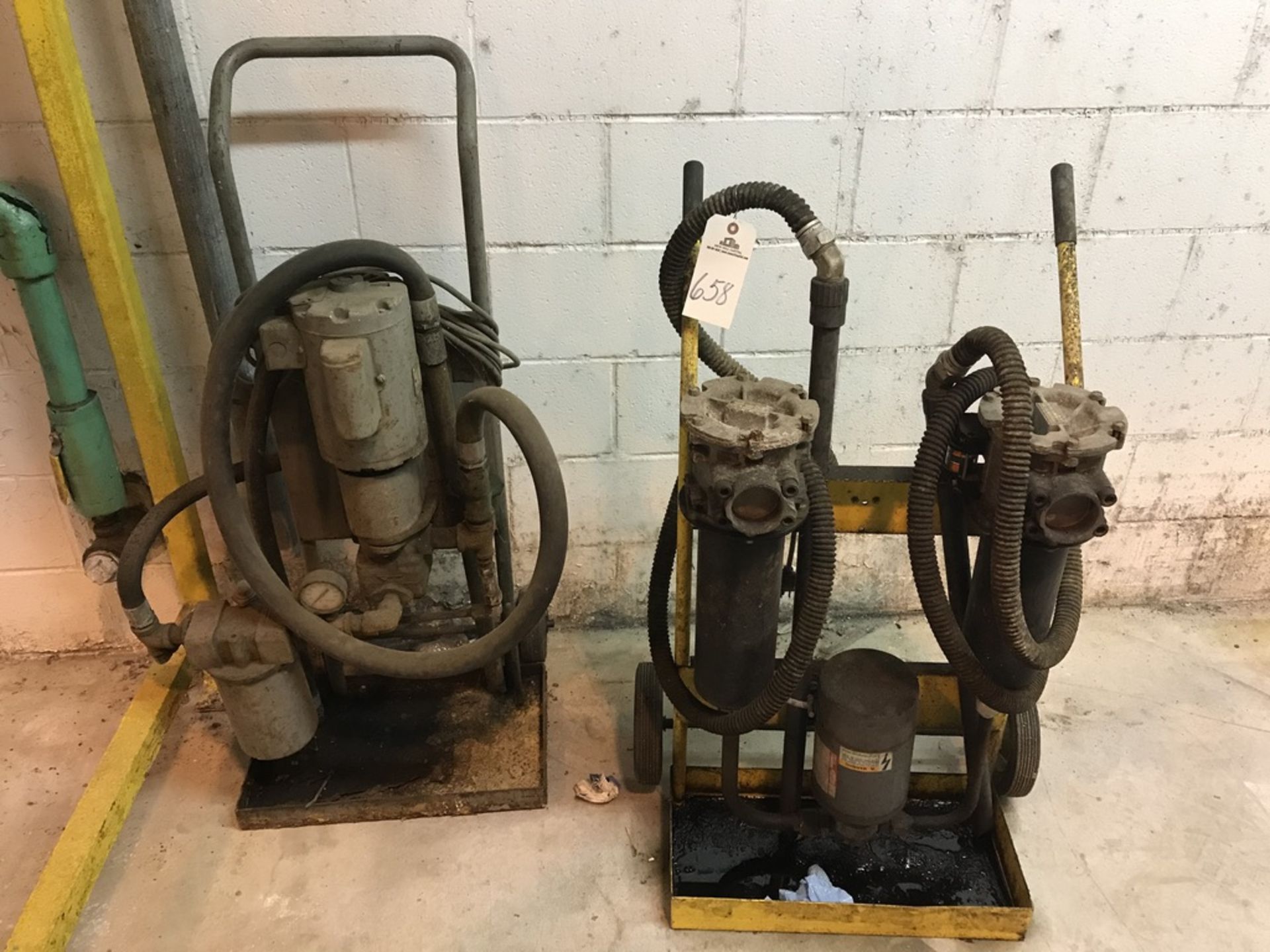 (2) OIL PUMPS WITH TWO-WHEEL DOLLIES | Rig Fee: $150