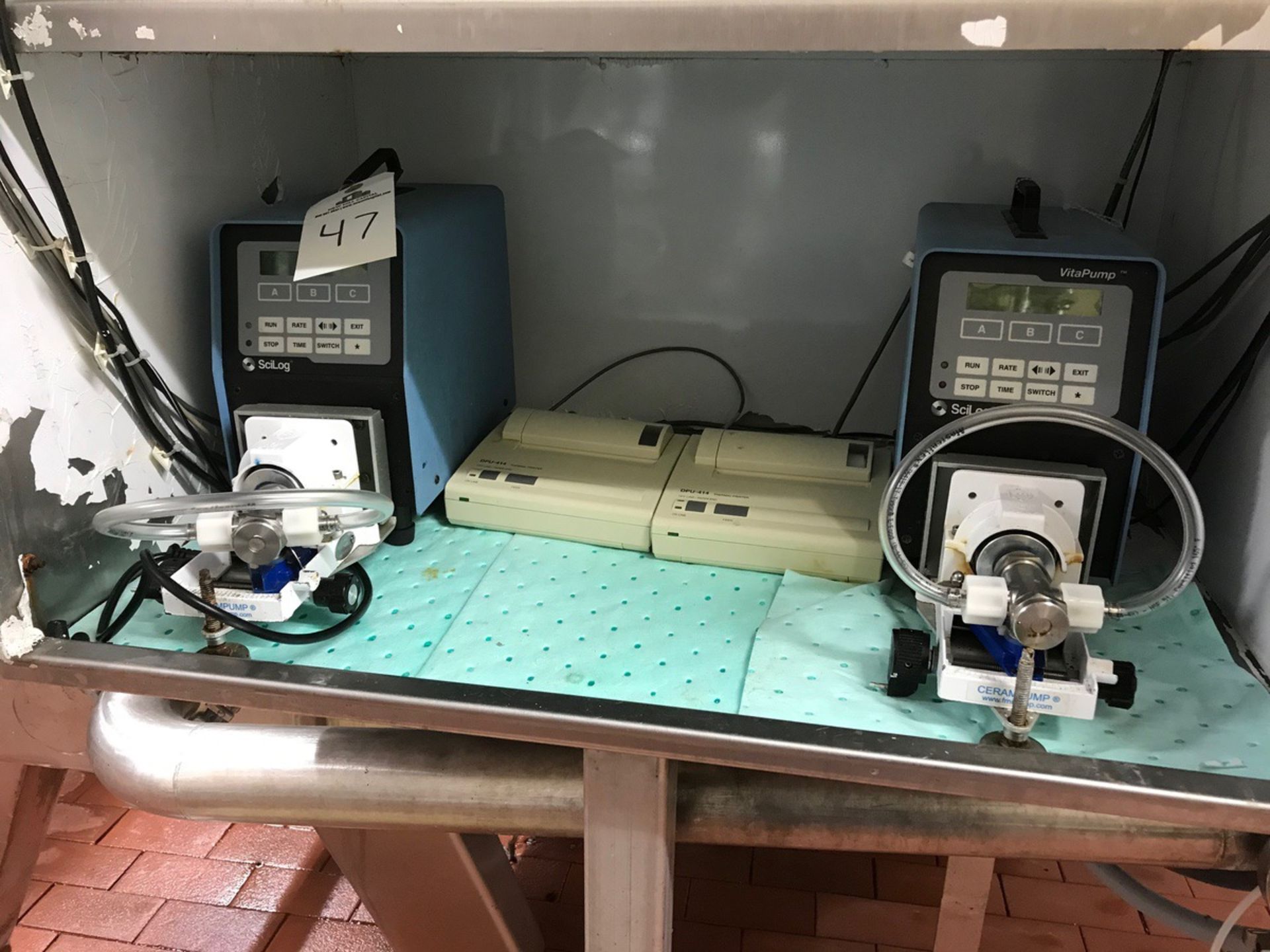 SCI LOG VITAMIN PUMPS WITH PRINTERS AND STAINLESS STEEL CABINET | Rig Fee: $250