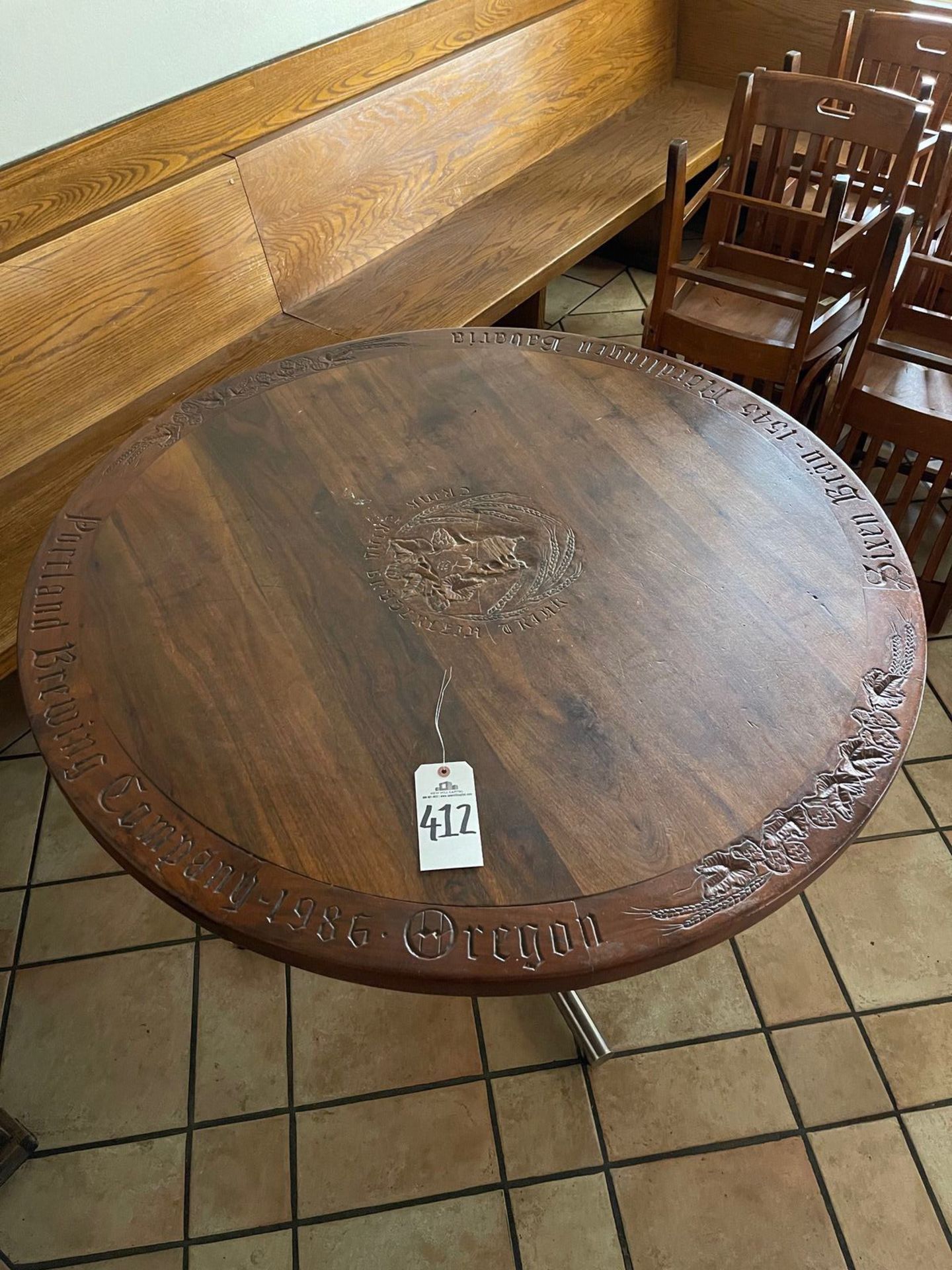 HAND CARVED PORTLAND BREWING CO. WOODEN TABLE FROM BREWHOUSE PRODUCER, 4' DIAMET | Rig Fee: See Desc