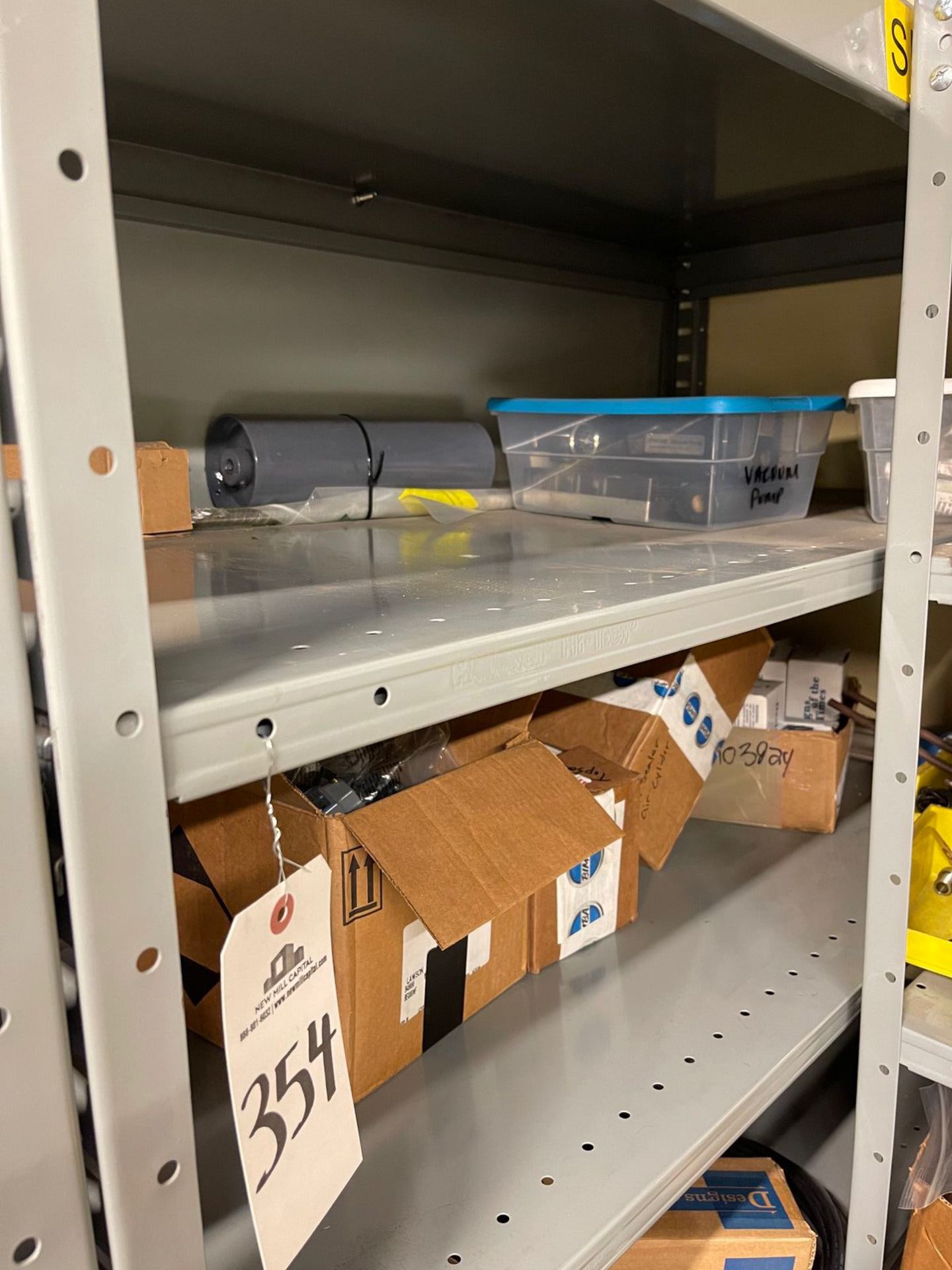 CONTENTS OF ENTIRE SHELVING UNIT TUCKED INTO CORNER, TO LEFT OF LOT 355 | Rig Fee: 50