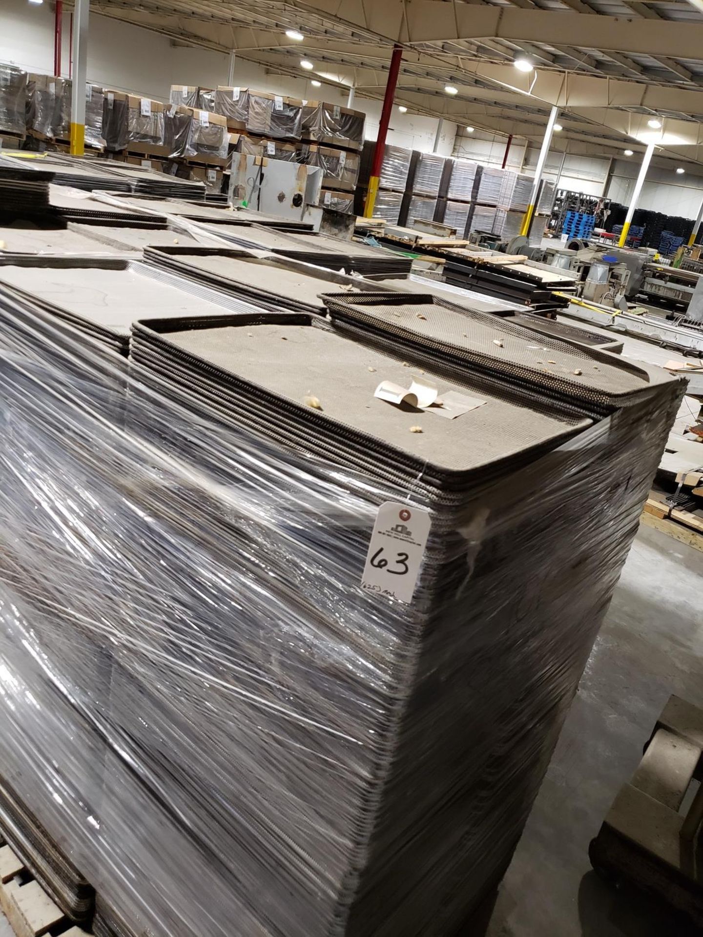 Lot of (625) Perforated Baking Sheets | Rig Fee: $100