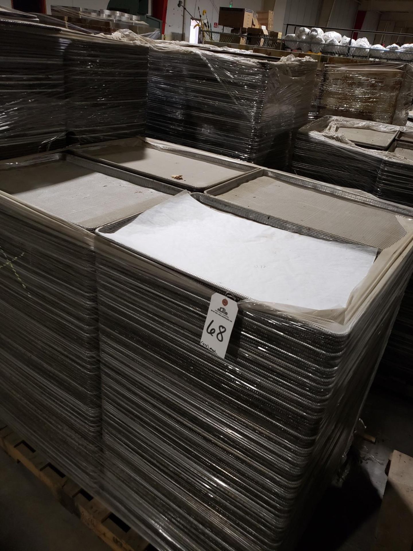 Lot of (472) Perforated Baking Sheets | Rig Fee: $100