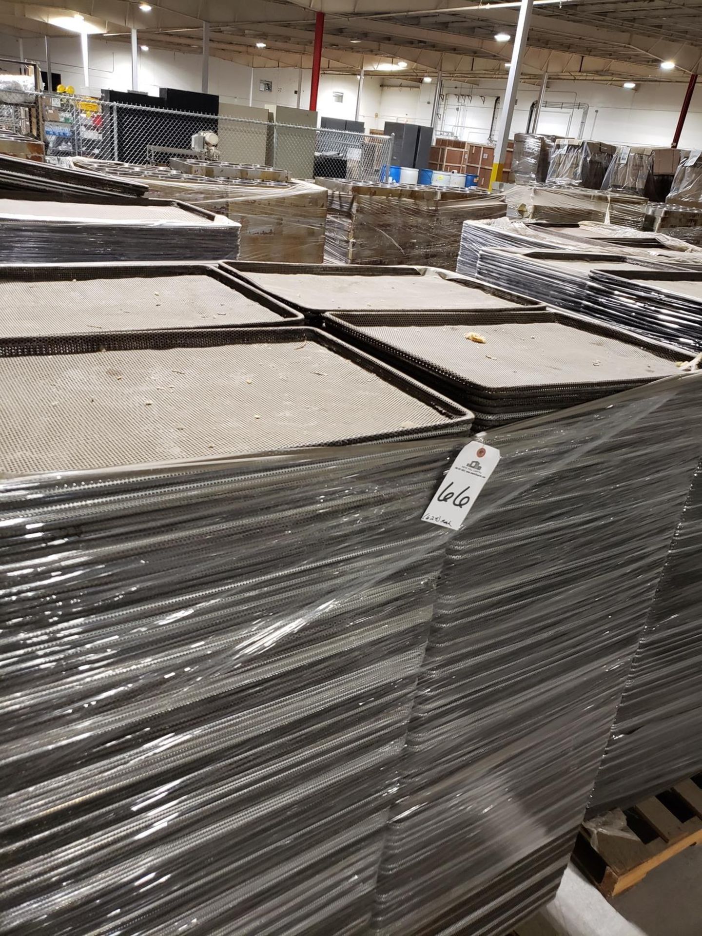 Lot of (628) Perforated Baking Sheets | Rig Fee: $100